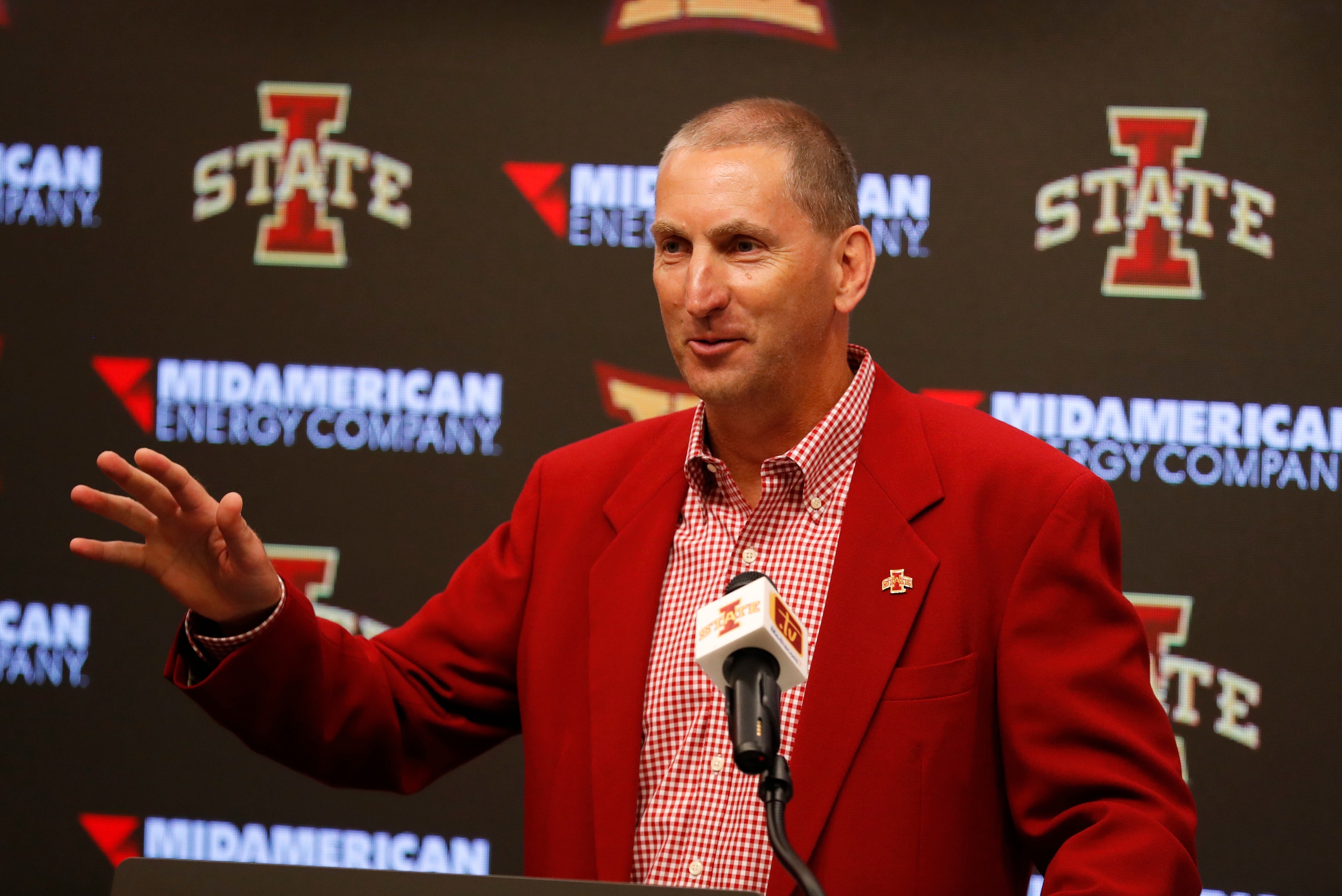 FILE - In this Aug. 1, 2018, file photo, Iowa State Athletic Director Jamie Pollard speaks during an NCAA college football news conference, in Ames, Iowa. Iowa State's athletic budget outlook is better than expected, and the school will push forward with several initiatives that should create new revenue streams, athletic director Jamie Pollard said in a video sent to fans Monday, Jan. 25, 2021. (AP Photo/Charlie Neibergall, File)