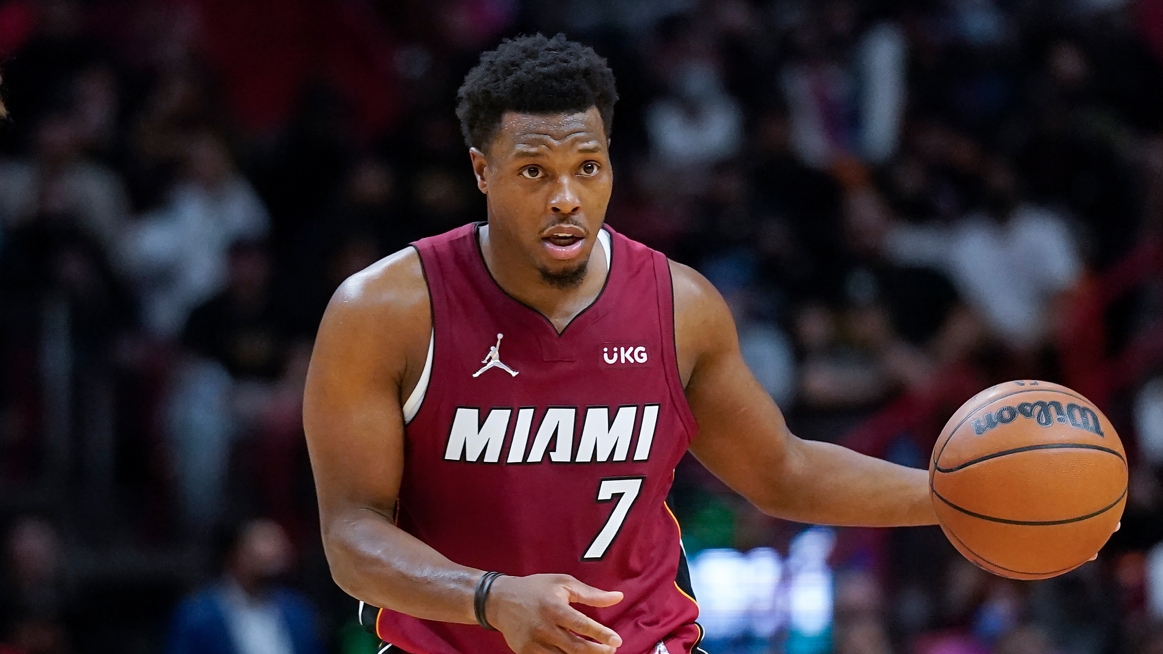 Miami Heat guard Kyle Lowry looks for an open teammate during the second half of an NBA basketball game against the Denver Nuggets, Monday, Nov. 29, 2021, in Miami. (AP Photo/Wilfredo Lee)
