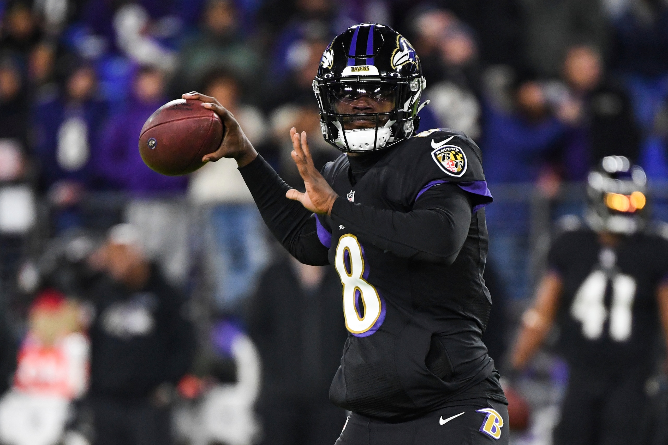 Baltimore Ravens quarterback Lamar Jackson (8) throws the ball during pre-game warm-ups before an NFL football game against the Cleveland Browns, Sunday, Nov. 28, 2021, in Baltimore. (AP Photo/Terrance Williams)