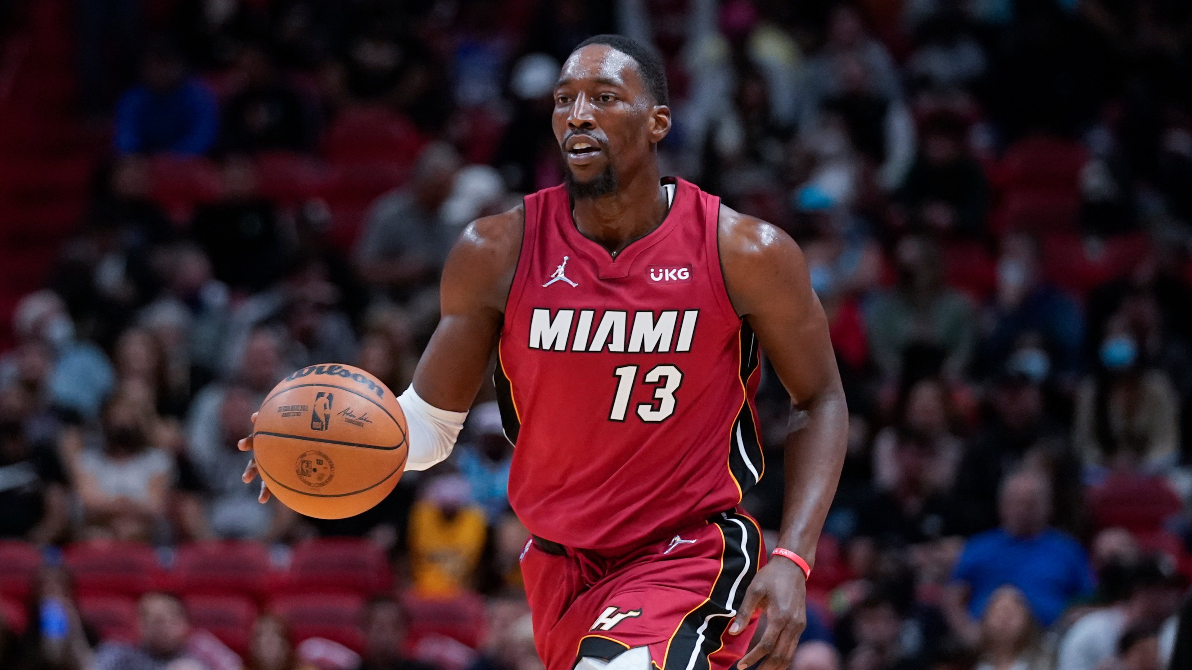 Miami Heat center Bam Adebayo takes the ball down court during the second half of an NBA basketball game against the Denver Nuggets, Monday, Nov. 29, 2021, in Miami. (AP Photo/Wilfredo Lee) Miami Heat center Bam Adebayo takes the ball down court during the second half of an NBA basketball game against the Denver Nuggets, Monday, Nov. 29, 2021, in Miami. (AP Photo/Wilfredo Lee)