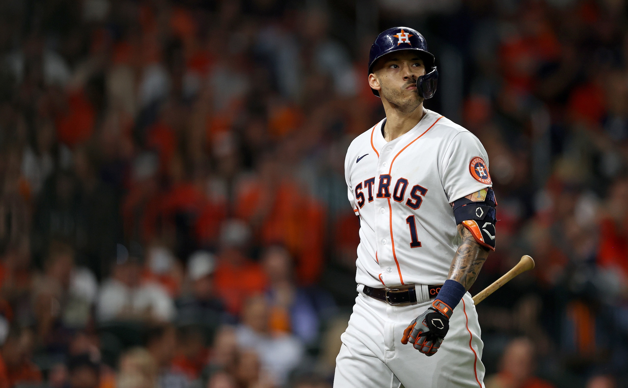 HOUSTON, TEXAS - NOVEMBER 02: Carlos Correa #1 of the Houston Astros reacts after striking out against the Atlanta Braves during the first inning in Game Six of the World Series at Minute Maid Park on November 02, 2021 in Houston, Texas. (Photo by Elsa/Getty Images) HOUSTON, TEXAS - NOVEMBER 02: Carlos Correa #1 of the Houston Astros reacts after striking out against the Atlanta Braves during the first inning in Game Six of the World Series at Minute Maid Park on November 02, 2021 in Houston, Texas. (Photo by Elsa/Getty Images)