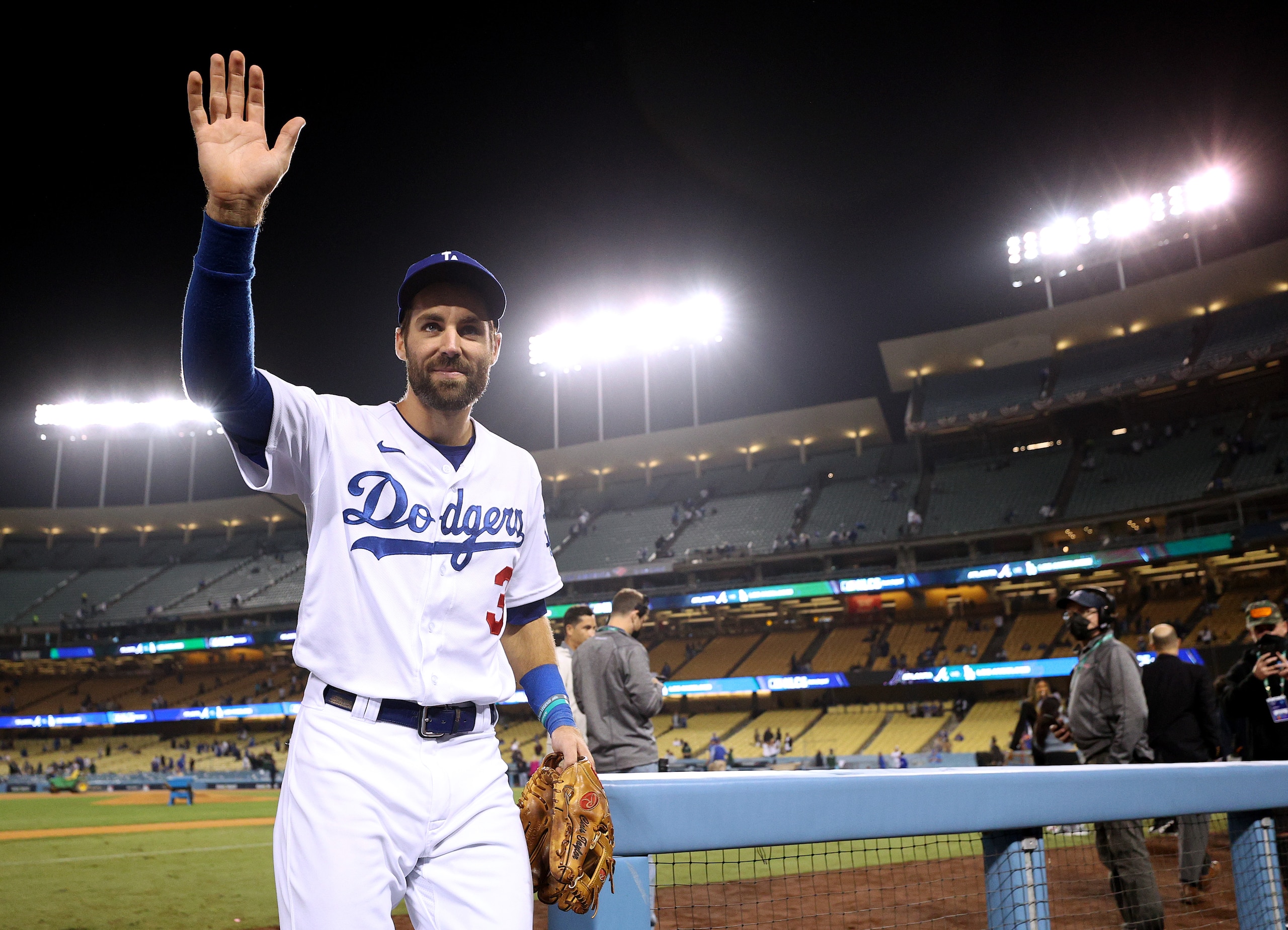 LOS ANGELES, CALIFORNIA - OCTOBER 21: Chris Taylor #3 of the Los Angeles Dodgers waves as he leaves the field after a three homerun night to lead the Dodgers 11-2 over the Atlanta Braves during game five of the National League Championship Series at Dodger Stadium on October 21, 2021 in Los Angeles, California. (Photo by Harry How/Getty Images)