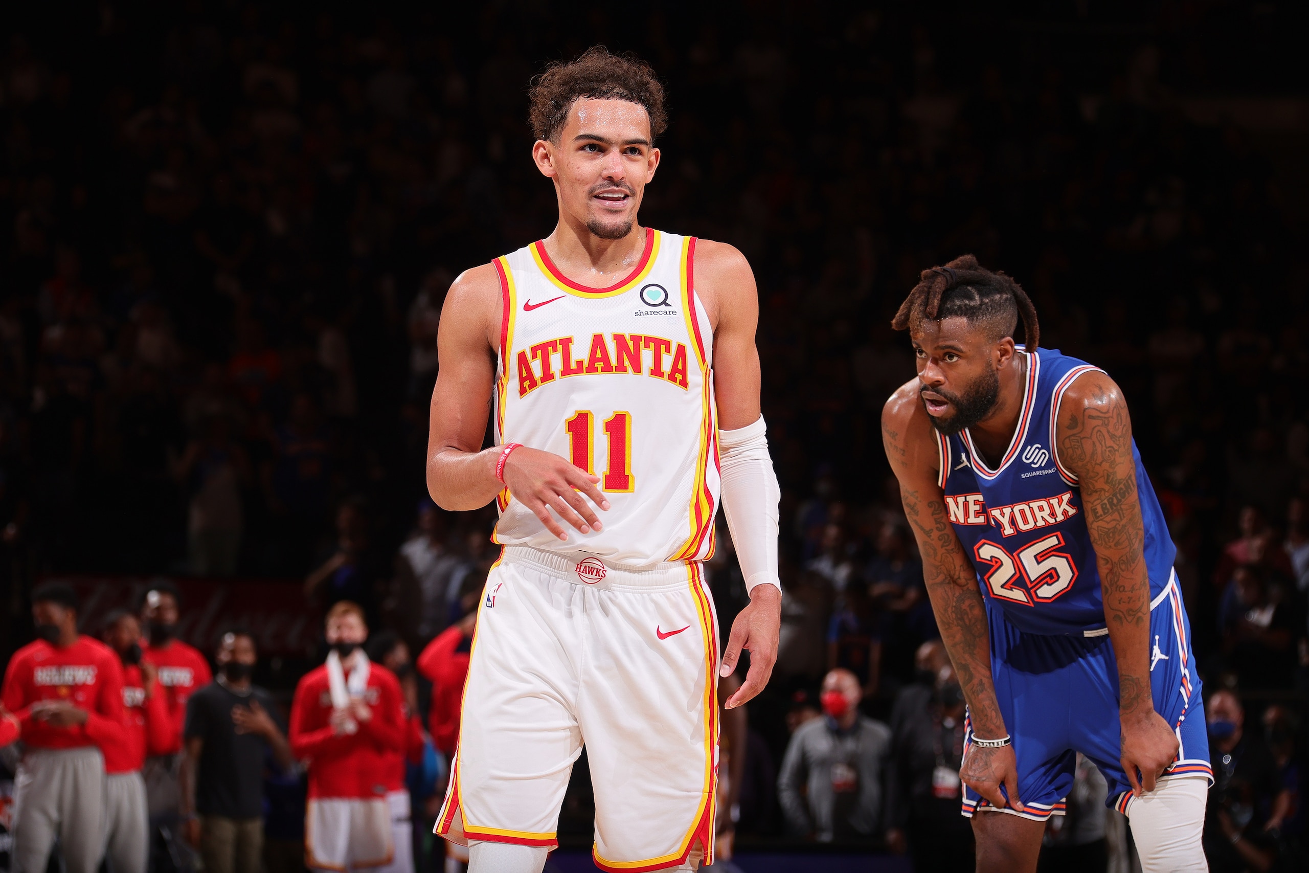 NEW YORK, NY - JUNE 2: Trae Young #11 of the Atlanta Hawks and Reggie Bullock #25 of the New York Knicks look on during Round 1, Game 5 of the 2021 NBA Playoffs on June 2, 2021 at Madison Square Garden in New York City, New York. NOTE TO USER: User expressly acknowledges and agrees that, by downloading and or using this photograph, User is consenting to the terms and conditions of the Getty Images License Agreement. Mandatory Copyright Notice: Copyright 2021 NBAE (Photo by Nathaniel S. Butler/NBAE via Getty Images) NEW YORK, NY - JUNE 2: Trae Young #11 of the Atlanta Hawks and Reggie Bullock #25 of the New York Knicks look on during Round 1, Game 5 of the 2021 NBA Playoffs on June 2, 2021 at Madison Square Garden in New York City, New York. NOTE TO USER: User expressly acknowledges and agrees that, by downloading and or using this photograph, User is consenting to the terms and conditions of the Getty Images License Agreement. Mandatory Copyright Notice: Copyright 2021 NBAE (Photo by Nathaniel S. Butler/NBAE via Getty Images)
