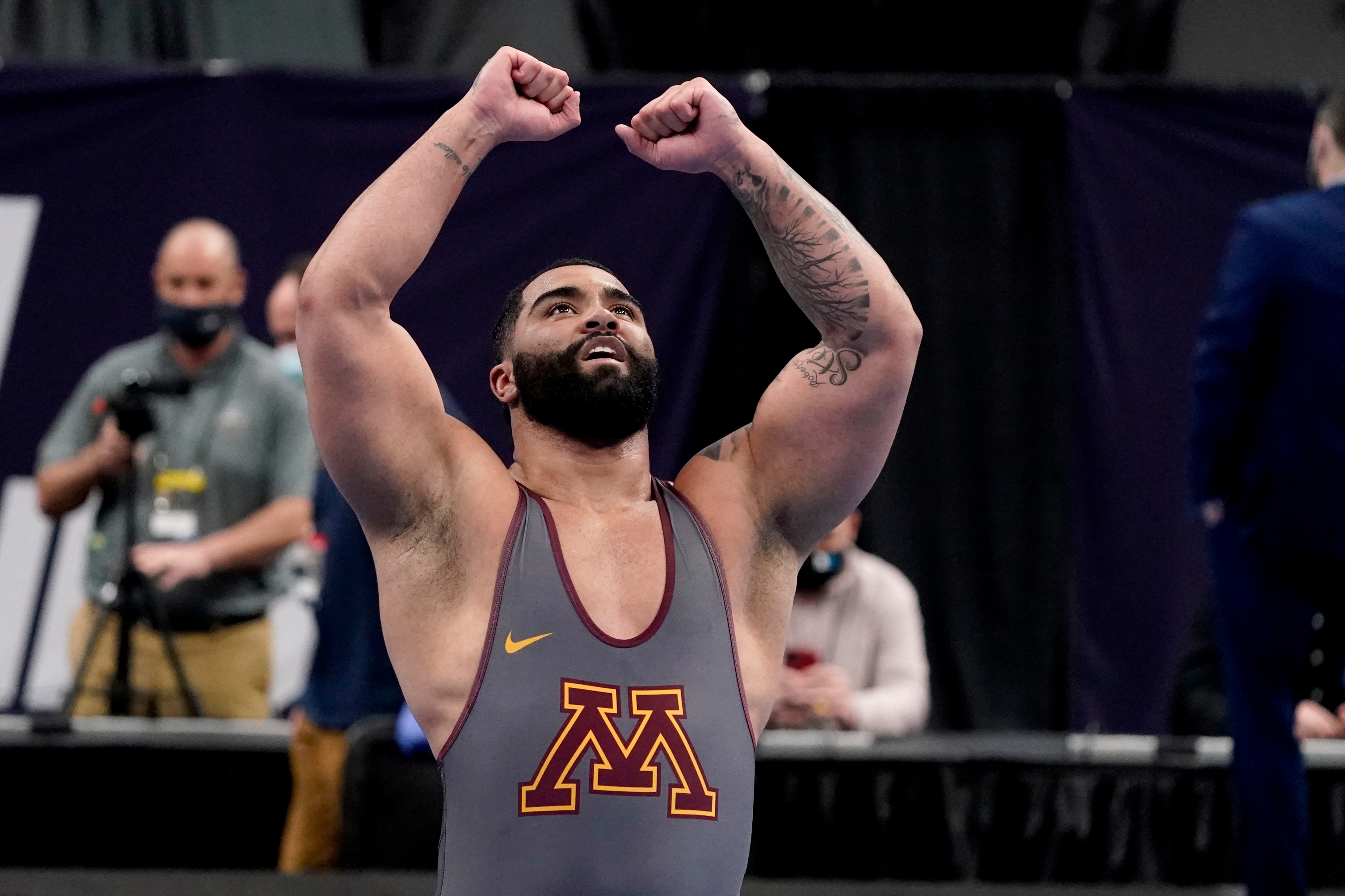 Minnesota's Gable Steveson celebrates after defeating Michigan's Mason Parris during their 285-pound match in the finals of the NCAA wrestling championships Saturday, March 20, 2021, in St. Louis. (AP Photo/Jeff Roberson)
