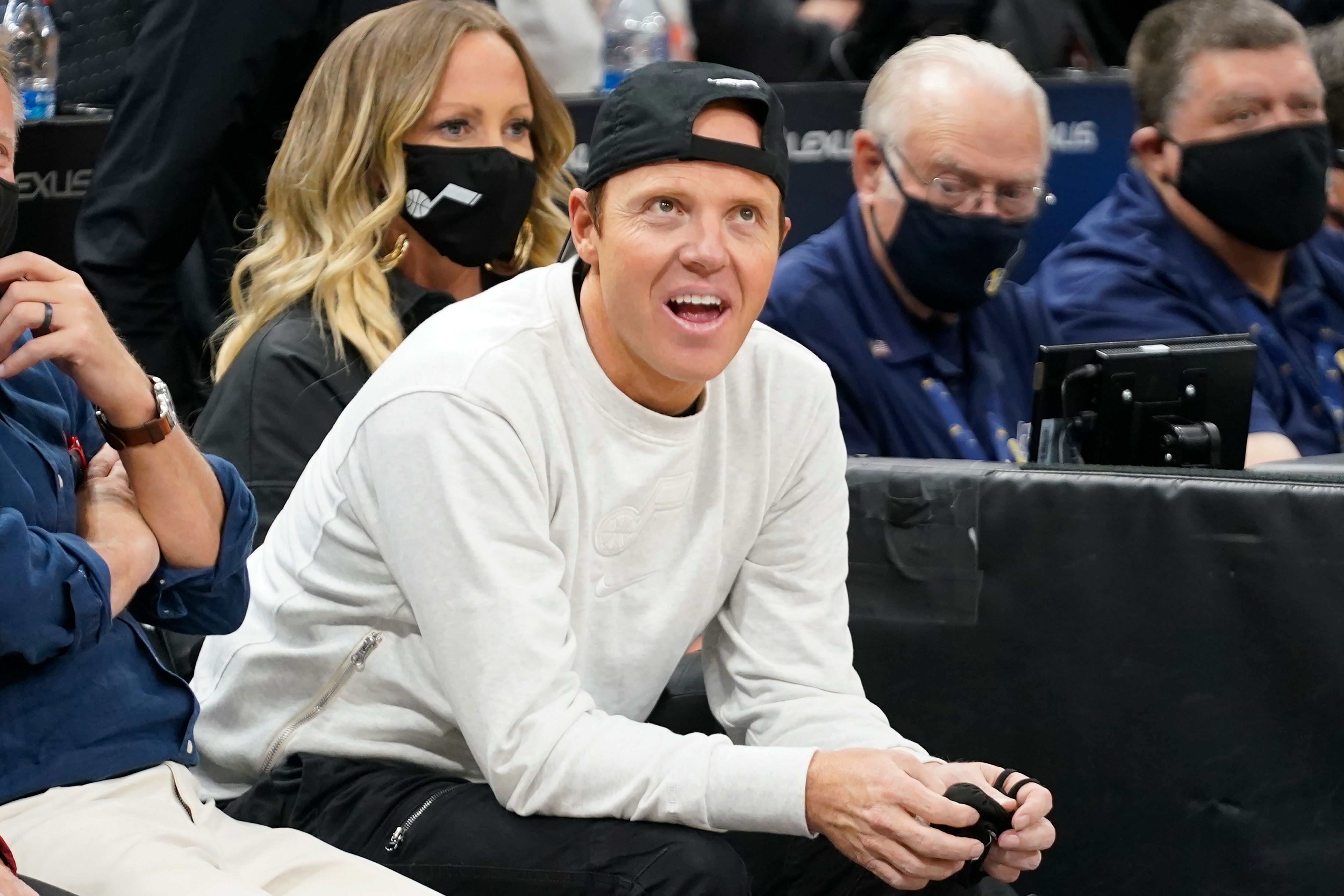 Utah Jazz owner Ryan Smith looks on before the start of their NBA basketball game against the Indiana Pacers Thursday, Nov. 11, 2021, in Salt Lake City. (AP Photo/Rick Bowmer)