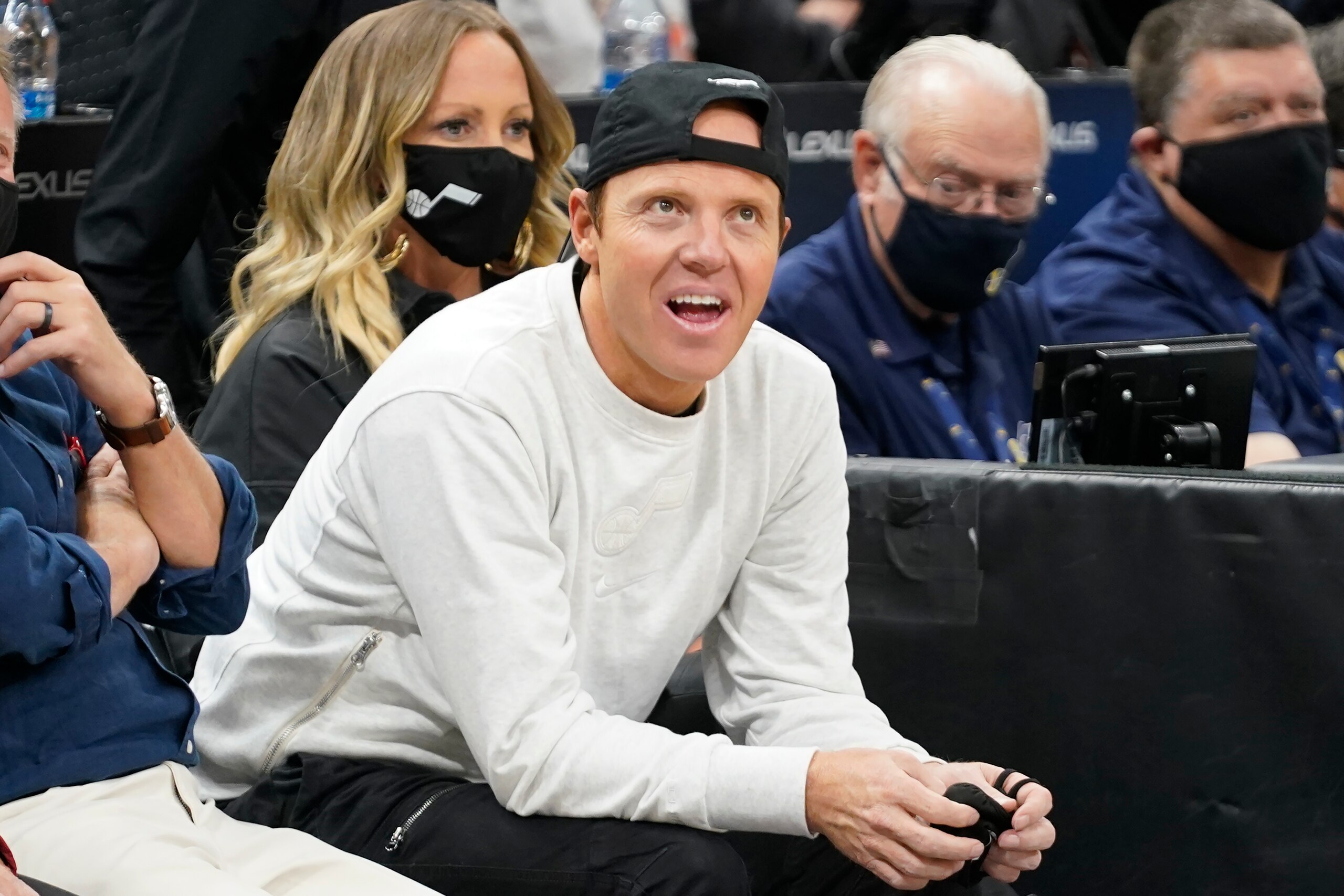 Utah Jazz owner Ryan Smith looks on before the start of their NBA basketball game against the Indiana Pacers Thursday, Nov. 11, 2021, in Salt Lake City. (AP Photo/Rick Bowmer)