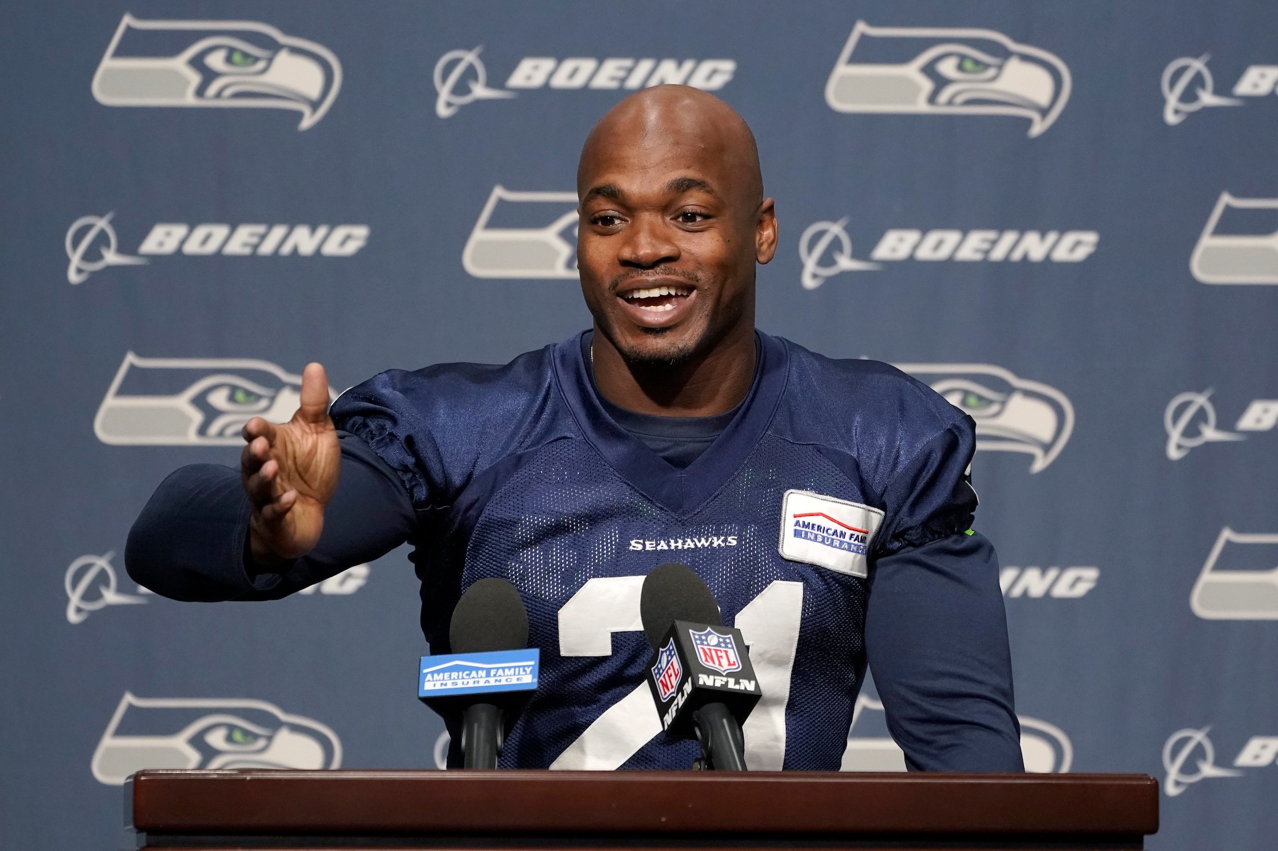 Adrian Peterson, who was signed to the Seattle Seahawks practice squad on Wednesday, talks to reporters Thursday, Dec. 2, 2021, before NFL football practice in Renton, Wash. (AP Photo/Ted S. Warren)
