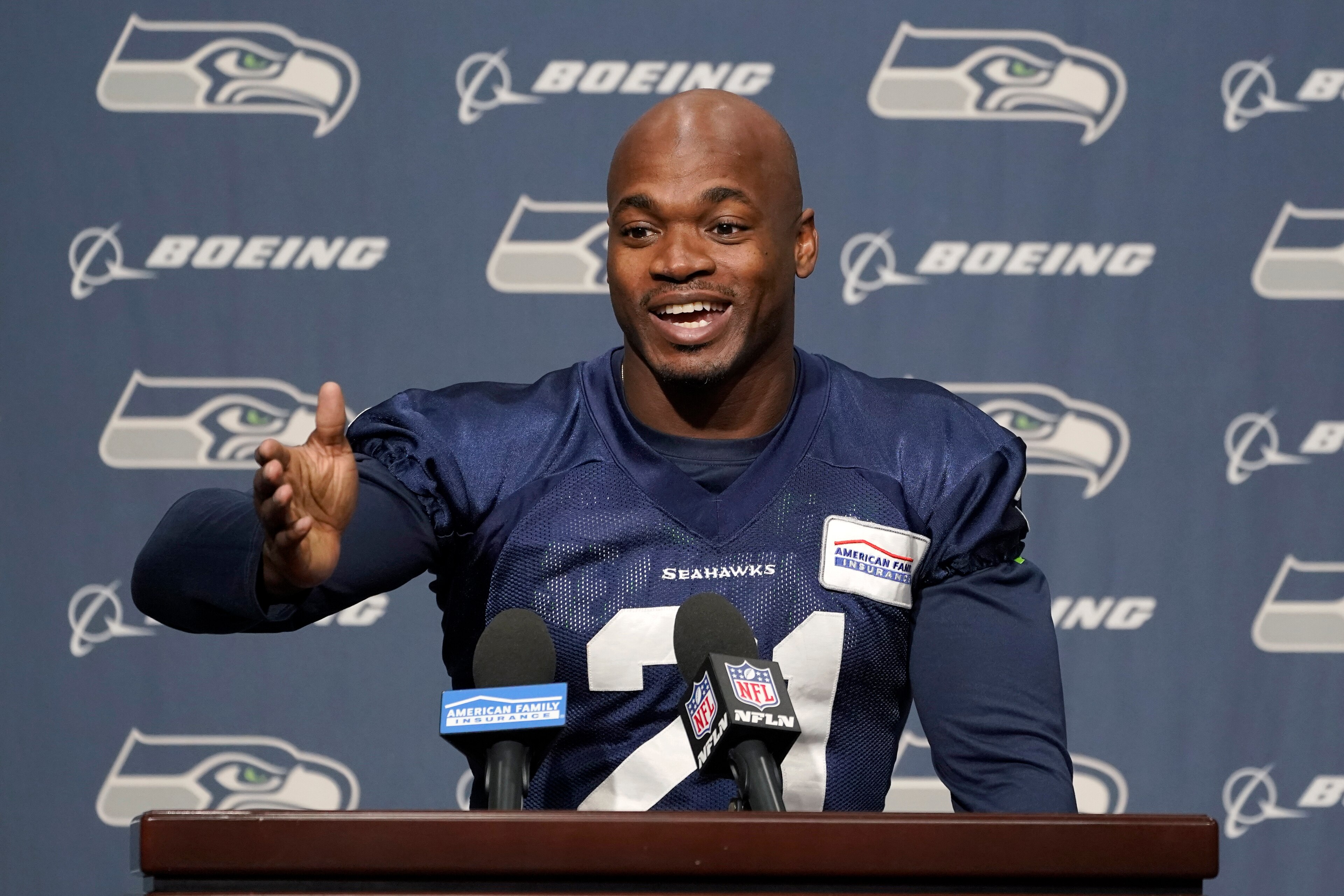 Adrian Peterson, who was signed to the Seattle Seahawks practice squad on Wednesday, talks to reporters Thursday, Dec. 2, 2021, before NFL football practice in Renton, Wash. (AP Photo/Ted S. Warren)