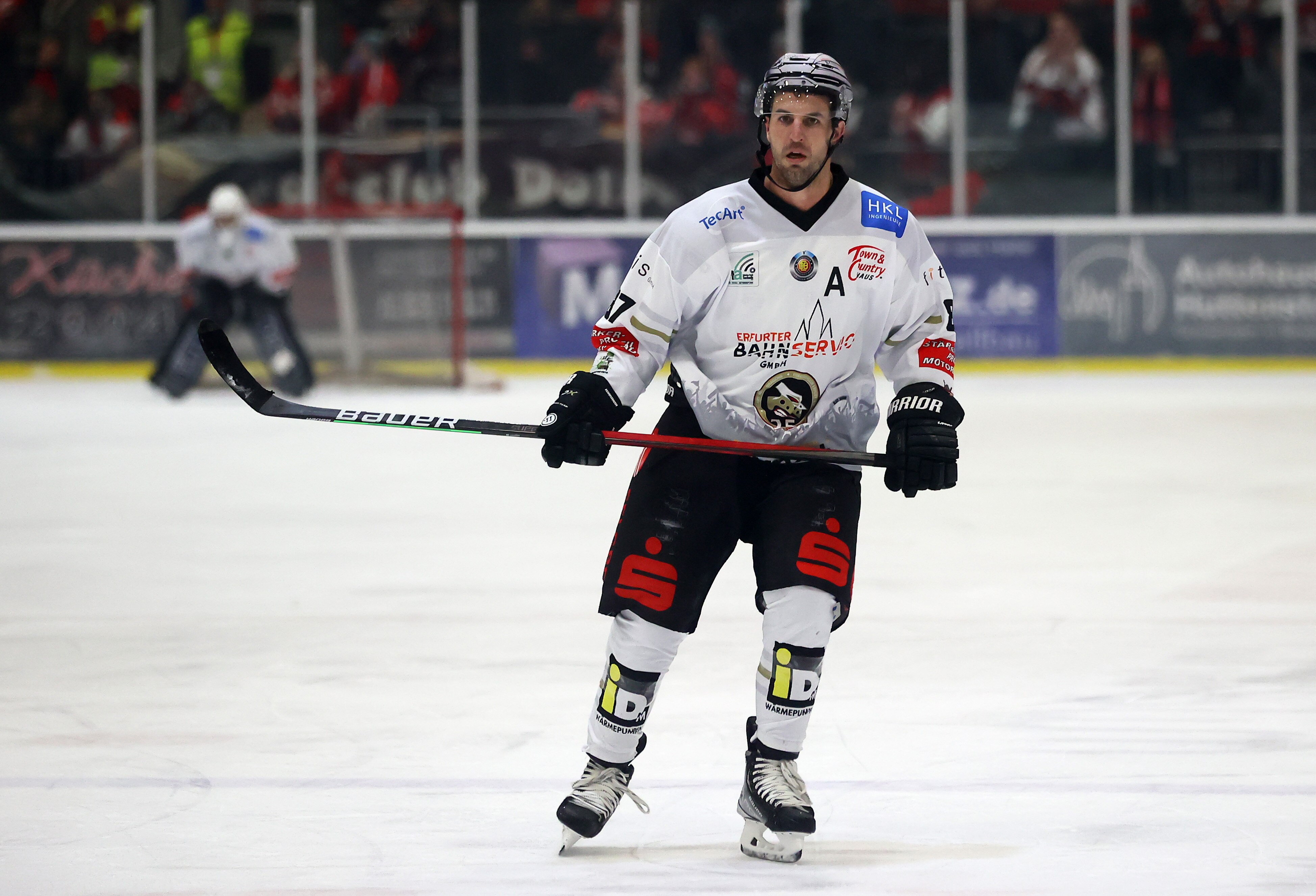 HALLE, GERMANY - NOVEMBER 16: Kyle Beach of TecArt Black Dragons Erfurt skates against the Saale Bulls Halle during the Oberliga Nord match between Saale Bulls Halle and TecArt Black Dragons Erfurt at Sparkassen-Eisdom on November 16, 2021 in Halle, Germany. (Photo by Martin Rose/Getty Images)