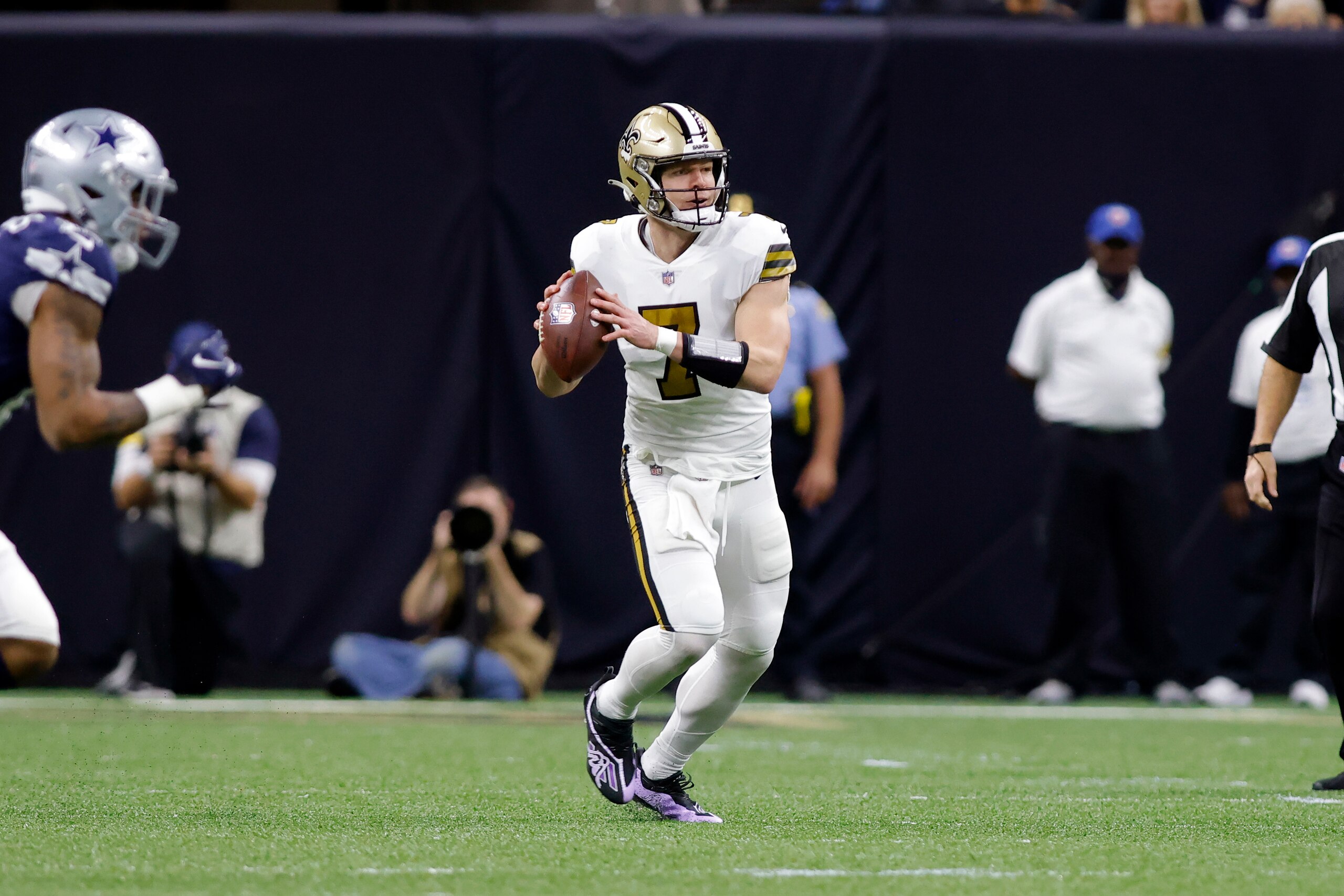 New Orleans Saints quarterback Taysom Hill (7) looks to pass during an NFL football game against the Dallas Cowboys, Thursday, Dec. 2, 2021, in New Orleans. (AP Photo/Tyler Kaufman)
