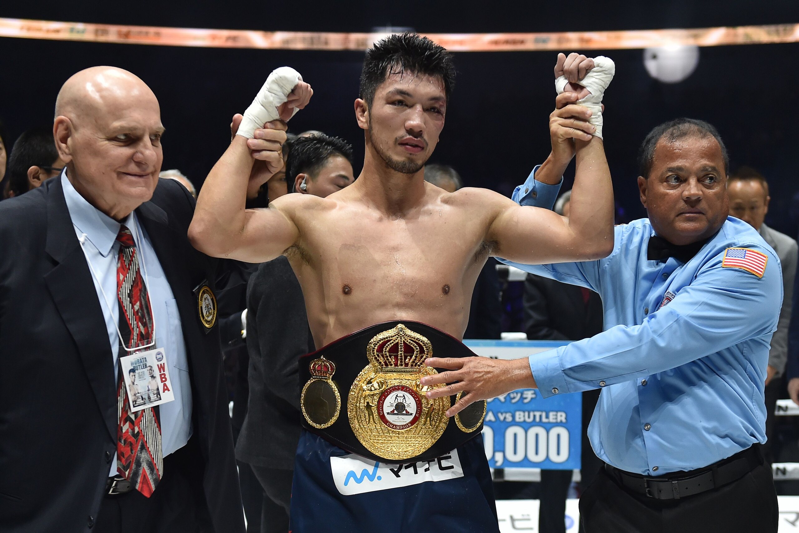 TOPSHOT - Japan's Ryota Murata (C) celebrates his win over Canada's Steven Butler after their WBA middleweight title match at Yokohama Arena in Yokohama, Kanagawa prefecture on December 23, 2019. (Photo by Kazuhiro NOGI / AFP) (Photo by KAZUHIRO NOGI/AFP via Getty Images)