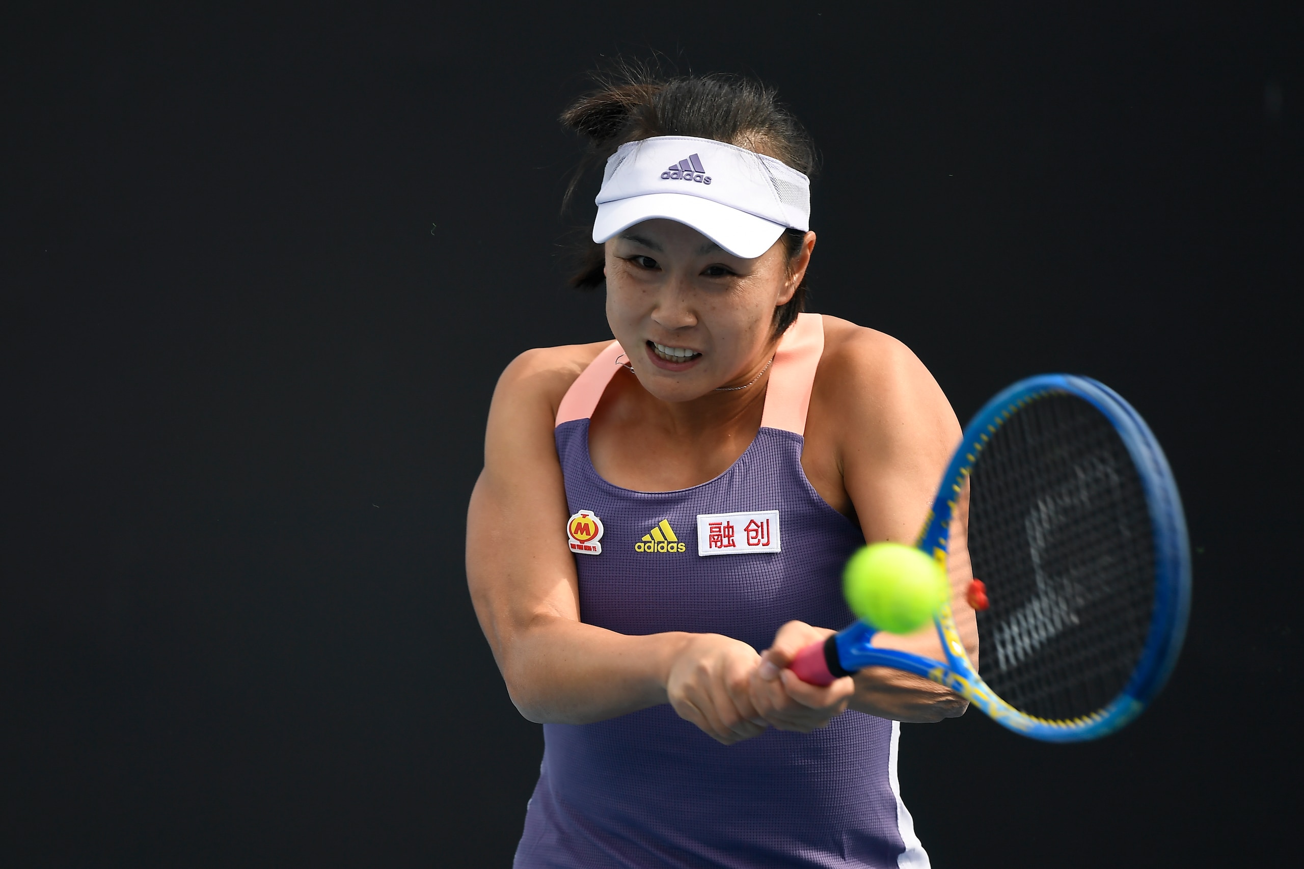 MELBOURNE, AUSTRALIA - JANUARY 21: Shuai Peng of China in action during her Women's Singles first round match against Nao Hibino of Japan on day two of the 2020 Australian Open at Melbourne Park on January 21, 2020 in Melbourne, Australia. (Photo by Fred Lee/Getty Images)