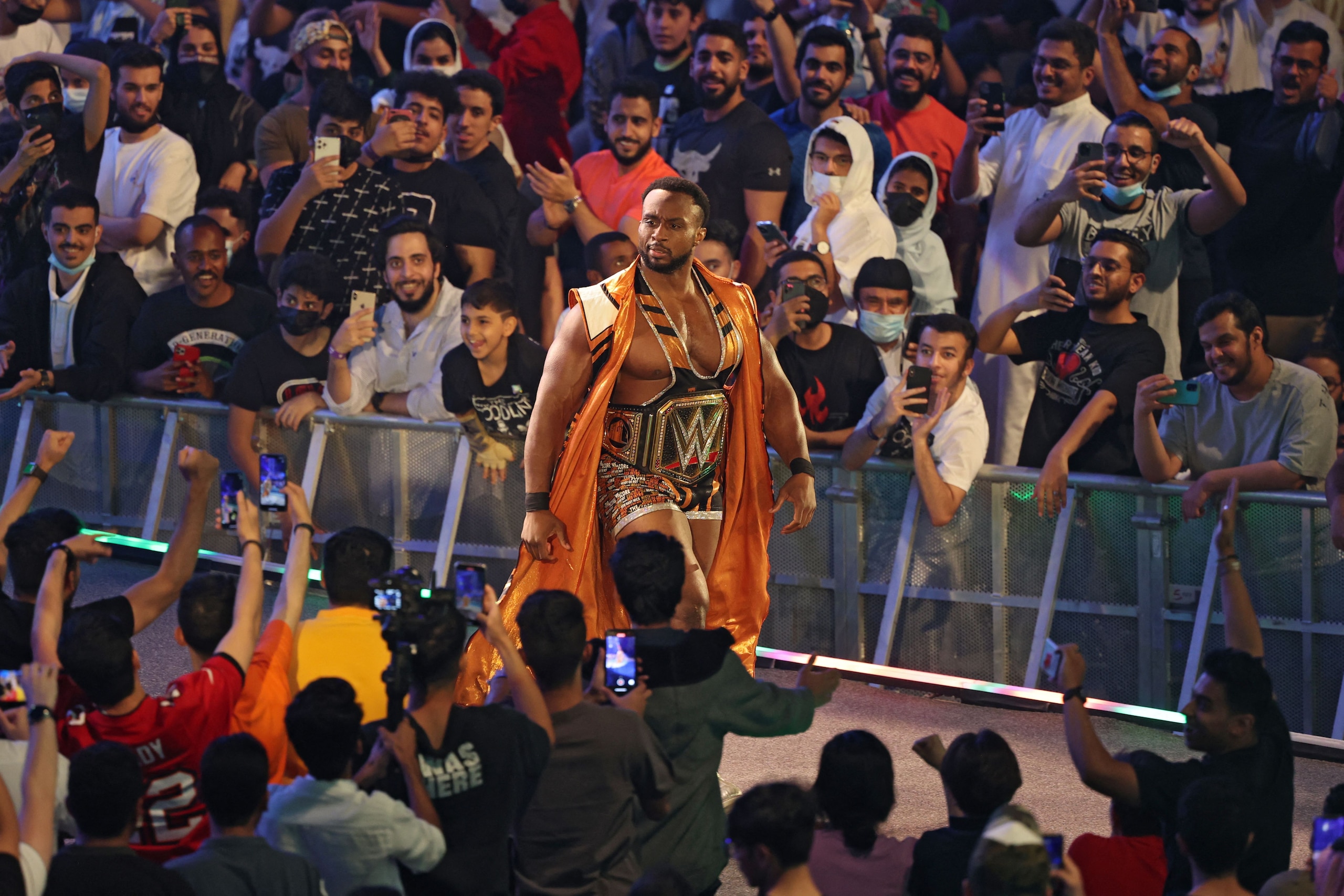 Big E arrives for his match during the World Wrestling Entertainment (WWE) Crown Jewel pay-per-view in the Saudi capital Riyadh on October 21, 2021. (Photo by Fayez Nureldine / AFP) (Photo by FAYEZ NURELDINE/AFP via Getty Images) Big E arrives for his match during the World Wrestling Entertainment (WWE) Crown Jewel pay-per-view in the Saudi capital Riyadh on October 21, 2021. (Photo by Fayez Nureldine / AFP) (Photo by FAYEZ NURELDINE/AFP via Getty Images)