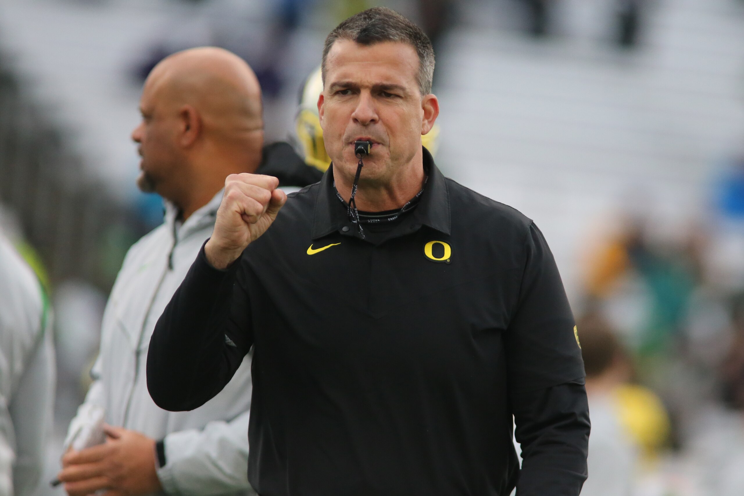 SEATTLE, WA - NOVEMBER 06: Oregon Ducks head coach Mario Cristobal runs dills before a college football game between the Oregon Ducks and the Washington Huskies on November 06, 2021, at Husky Stadium in Seattle, WA. (Photo by Jacob Snow/Icon Sportswire via Getty Images)
