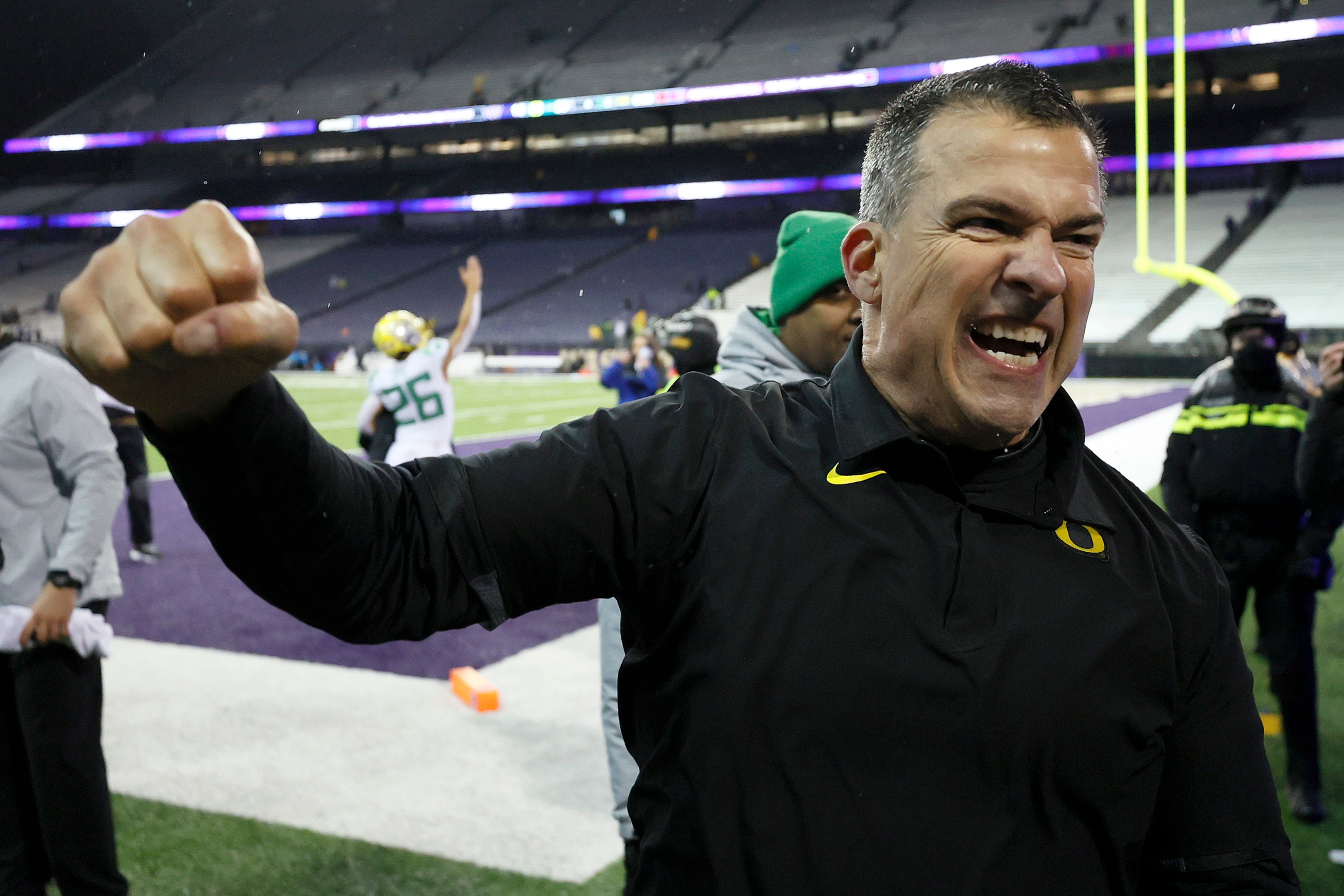 SEATTLE, WASHINGTON - NOVEMBER 06: Head coach Mario Cristobal of the Oregon Ducks celebrates after beating Washington Huskies 26-16 at Husky Stadium on November 06, 2021 in Seattle, Washington. (Photo by Steph Chambers/Getty Images)