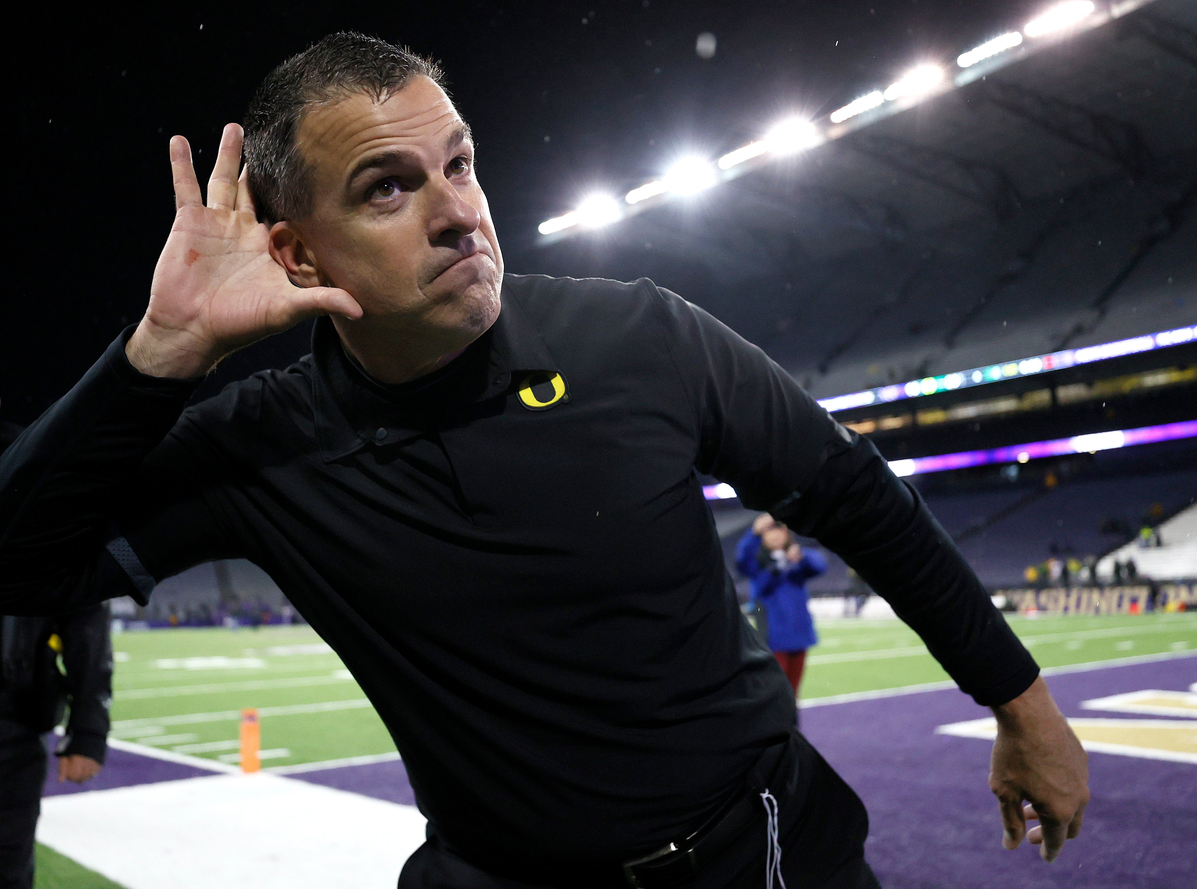 SEATTLE, WASHINGTON - NOVEMBER 06: Head coach Mario Cristobal of the Oregon Ducks celebrates after beating Washington Huskies 26-16 at Husky Stadium on November 06, 2021 in Seattle, Washington. (Photo by Steph Chambers/Getty Images)