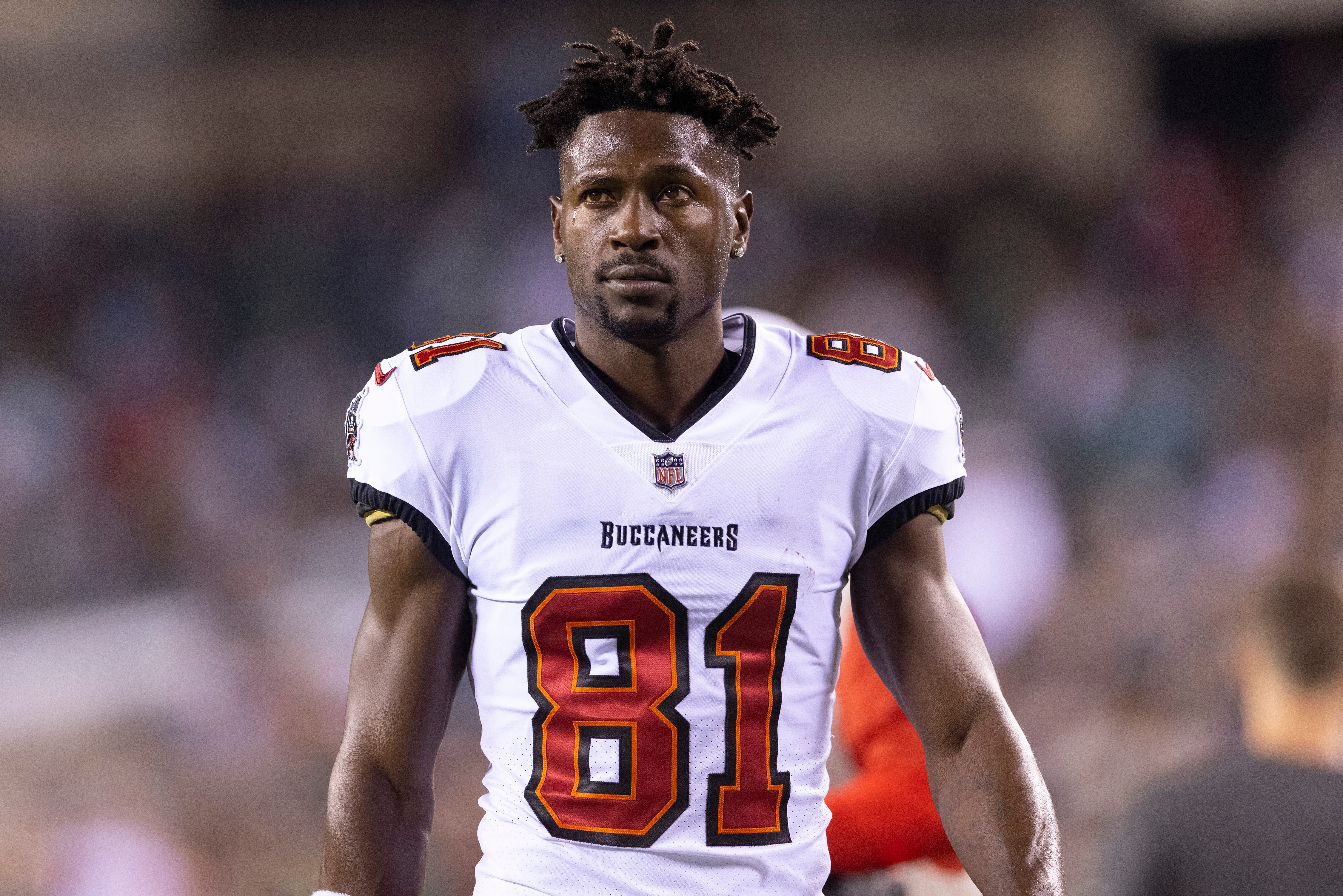 PHILADELPHIA, PA - OCTOBER 14: Antonio Brown #81 of the Tampa Bay Buccaneers looks on prior to the game against the Philadelphia Eagles at Lincoln Financial Field on October 14, 2021 in Philadelphia, Pennsylvania. (Photo by Mitchell Leff/Getty Images) PHILADELPHIA, PA - OCTOBER 14: Antonio Brown #81 of the Tampa Bay Buccaneers looks on prior to the game against the Philadelphia Eagles at Lincoln Financial Field on October 14, 2021 in Philadelphia, Pennsylvania. (Photo by Mitchell Leff/Getty Images)