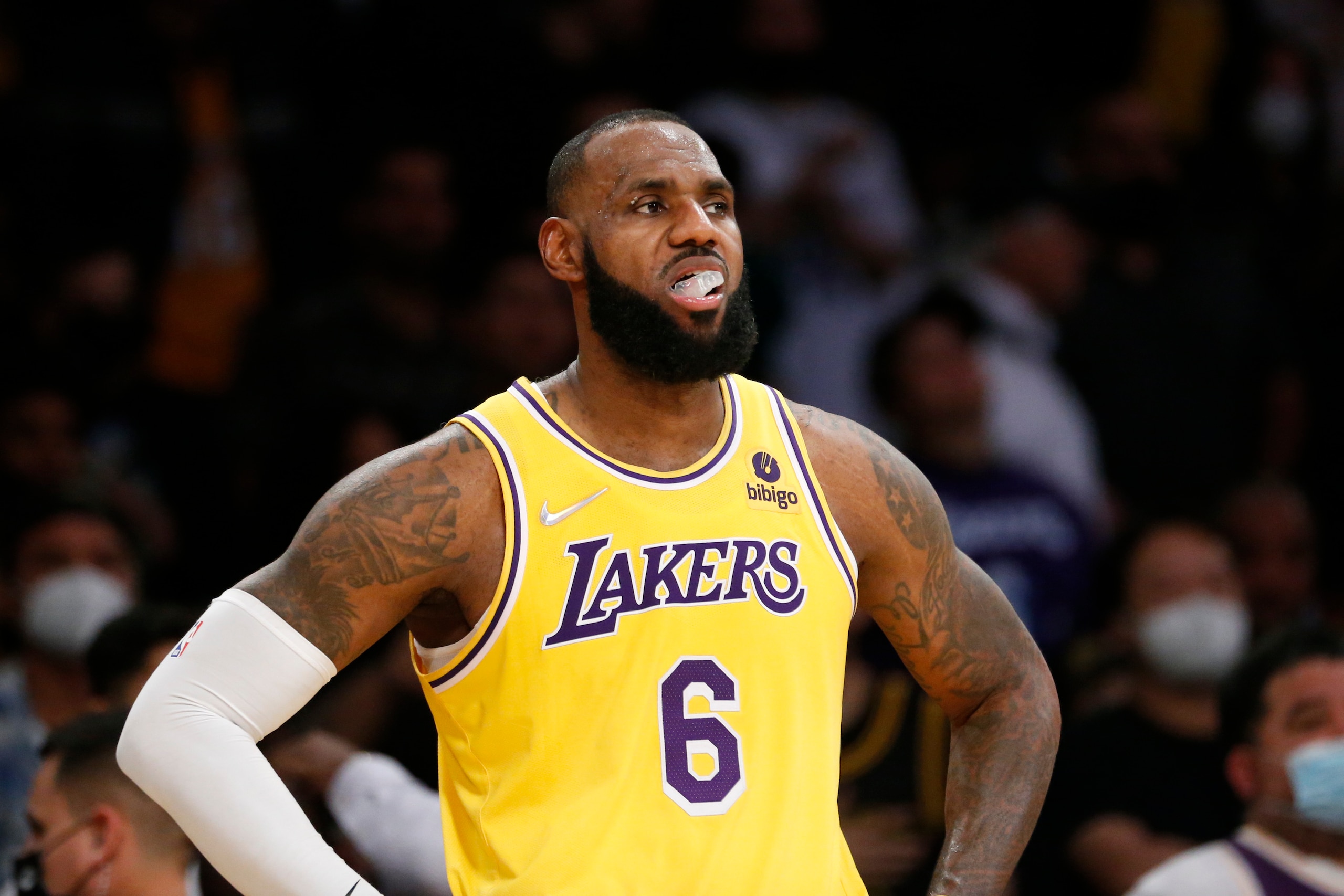 Los Angeles Lakers forward LeBron James (6) looks on against the Sacramento Kings during the second half of an NBA basketball game in Los Angeles, Friday, Nov. 26, 2021. The Kings won 141-137 in triple overtime. (AP Photo/Ringo H.W. Chiu)