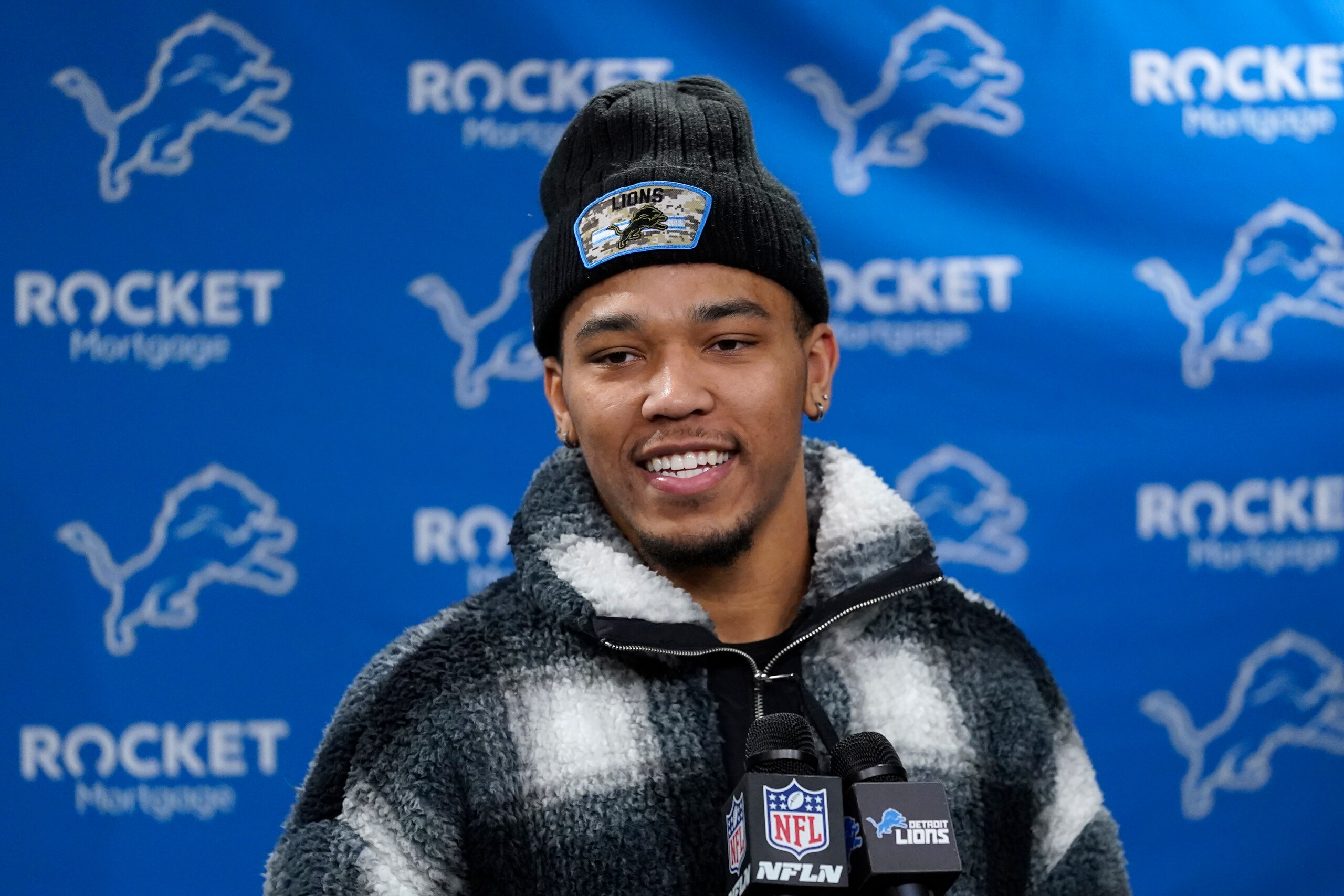 Detroit Lions wide receiver Amon-Ra St. Brown addresses the media after an NFL football game against the Minnesota Vikings, Sunday, Dec. 5, 2021, in Detroit. (AP Photo/Paul Sancya)