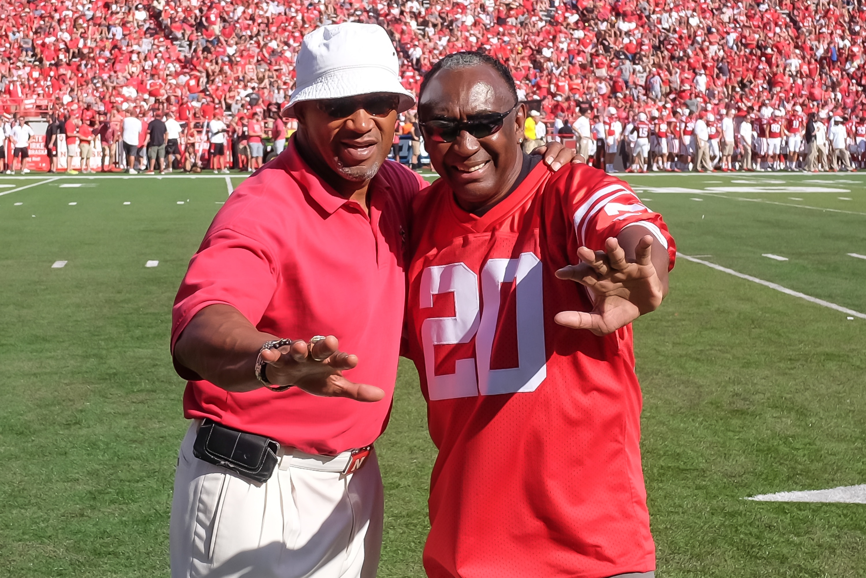 LINCOLN, NE - SEPTEMBER 23: Former Heisman Trophy winners Mike Rozier and Johnny Rodgers pose during a break in the game between the Nebraska Cornhuskers and the Rutgers Scarlet Knights at Memorial Stadium on September 23, 2017 in Lincoln, Nebraska. (Photo by Steven Branscombe/Getty Images)