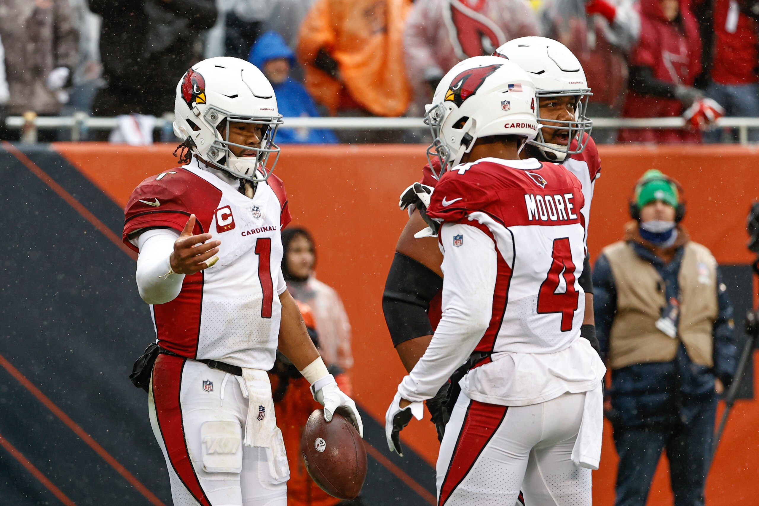 Arizona Cardinals quarterback Kyler Murray (1) celebrates with wide receiver Rondale Moore (4) after scoring a touchdown against the Chicago Bears during the first half of an NFL football game, Sunday, Dec. 5, 2021, in Chicago. (AP Photo/Kamil Krzaczynski)