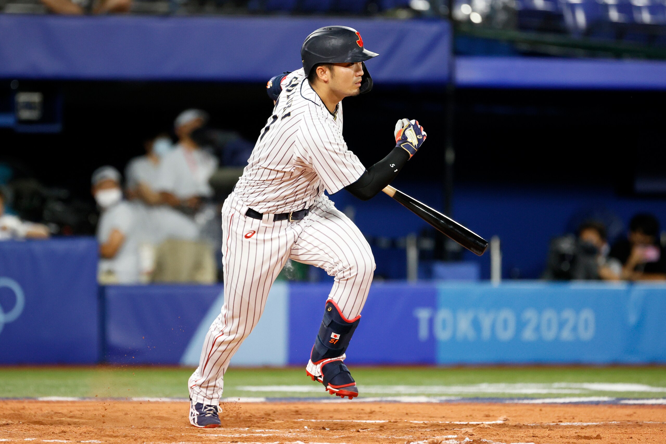 YOKOHAMA, JAPAN - AUGUST 07: Outfielder Seiya Suzuki #51 of Team Japan hits a single in the six during the gold medal game between Team United States and Team Japan on day fifteen of the Tokyo 2020 Olympic Games at Yokohama Baseball Stadium on August 07, 2021 in Yokohama, Kanagawa, Japan. (Photo by Steph Chambers/Getty Images)