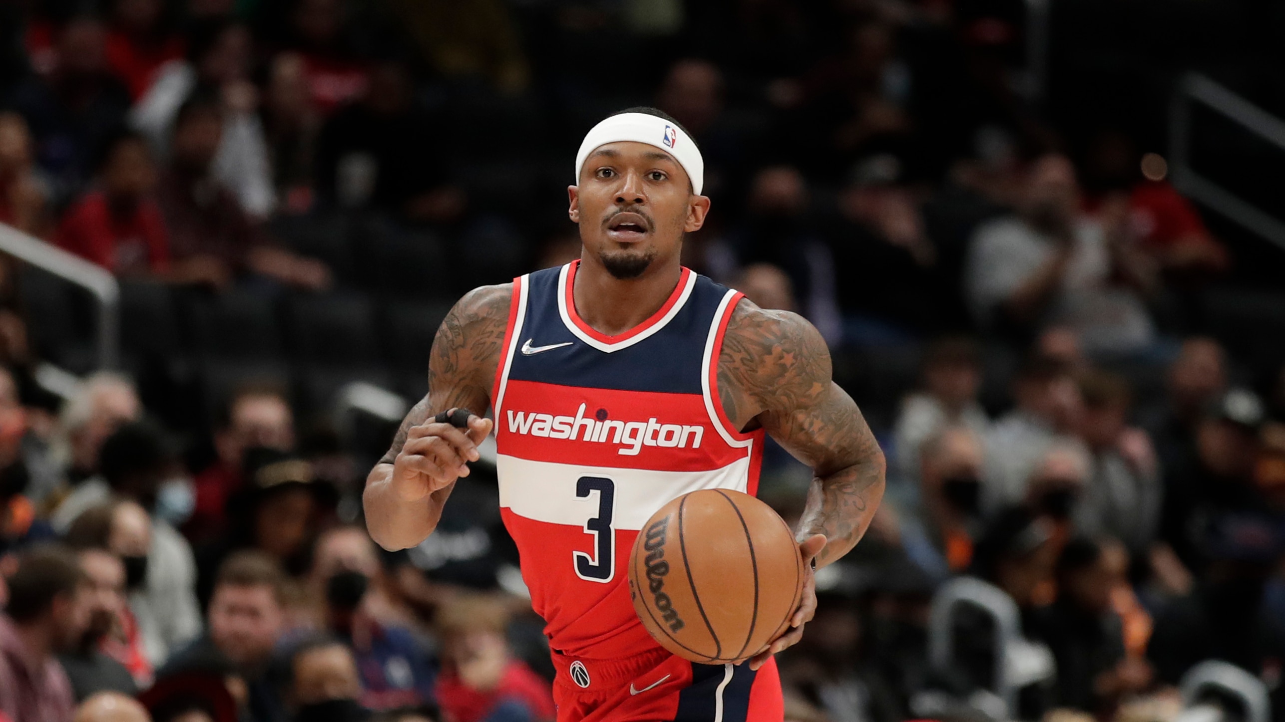 Washington Wizards' Bradley Beal moves the ball during the first half of an NBA basketball game against the Cleveland Cavaliers, Friday, Dec. 3, 2021, in Washington. (AP Photo/Luis M. Alvarez)
