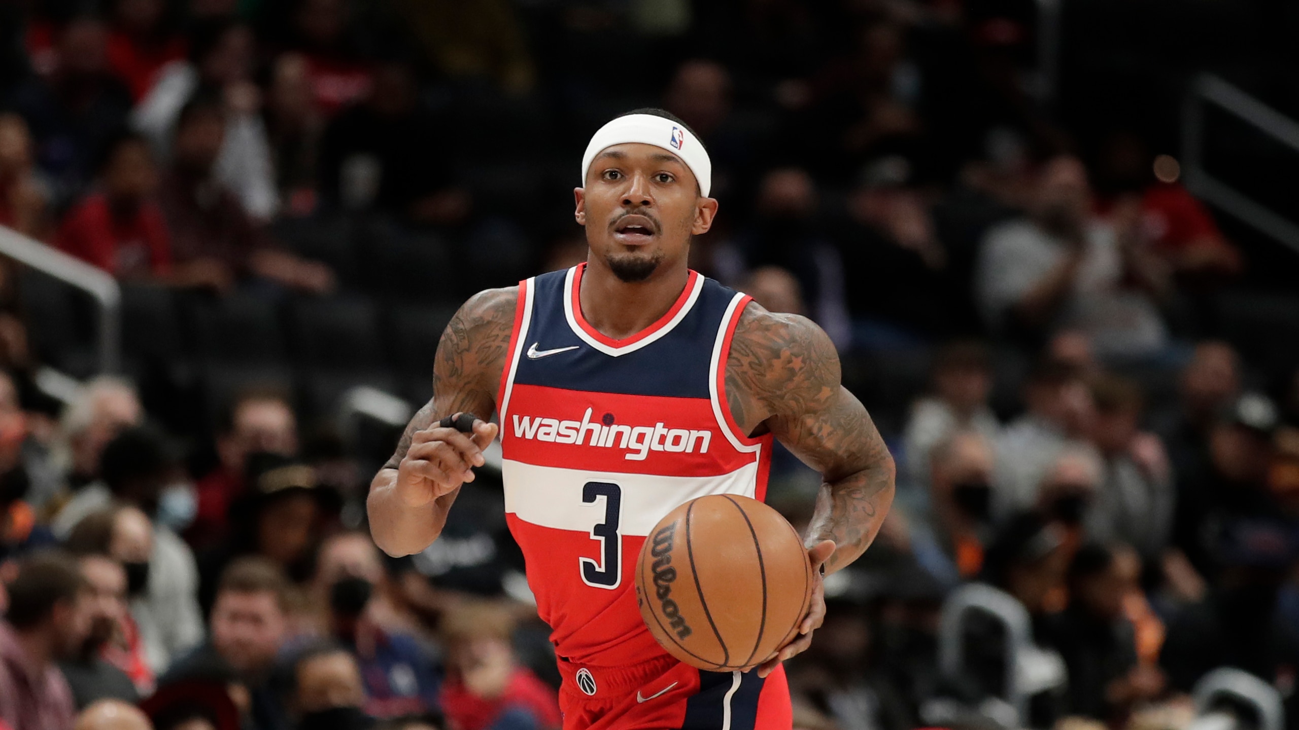 Washington Wizards' Bradley Beal moves the ball during the first half of an NBA basketball game against the Cleveland Cavaliers, Friday, Dec. 3, 2021, in Washington. (AP Photo/Luis M. Alvarez)