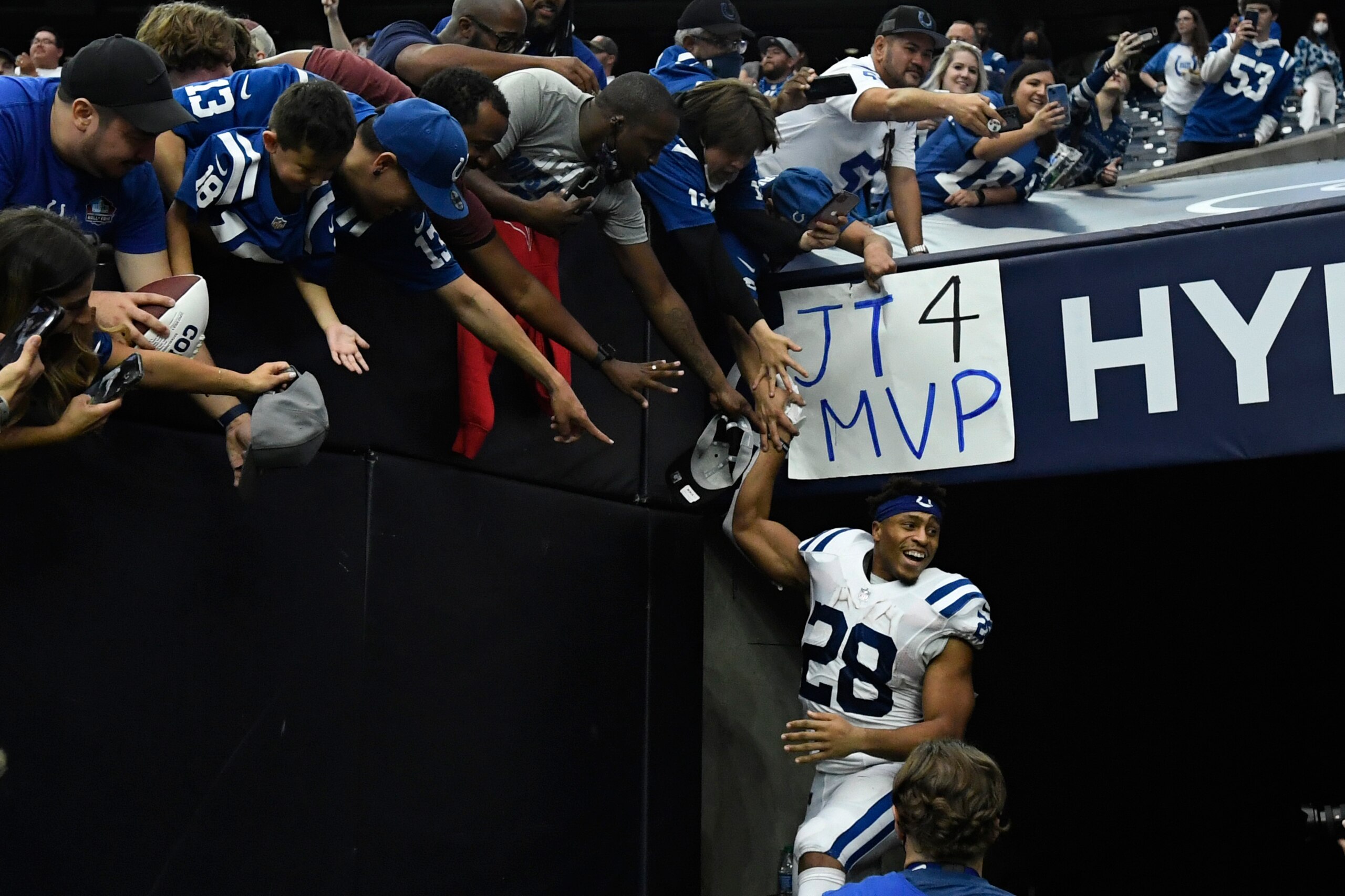 Indianapolis Colts running back Jonathan Taylor (28) visits with fans following an NFL football game against the Houston Texans, Sunday, Dec. 5, 2021, in Houston. (AP Photo/Justin Rex )