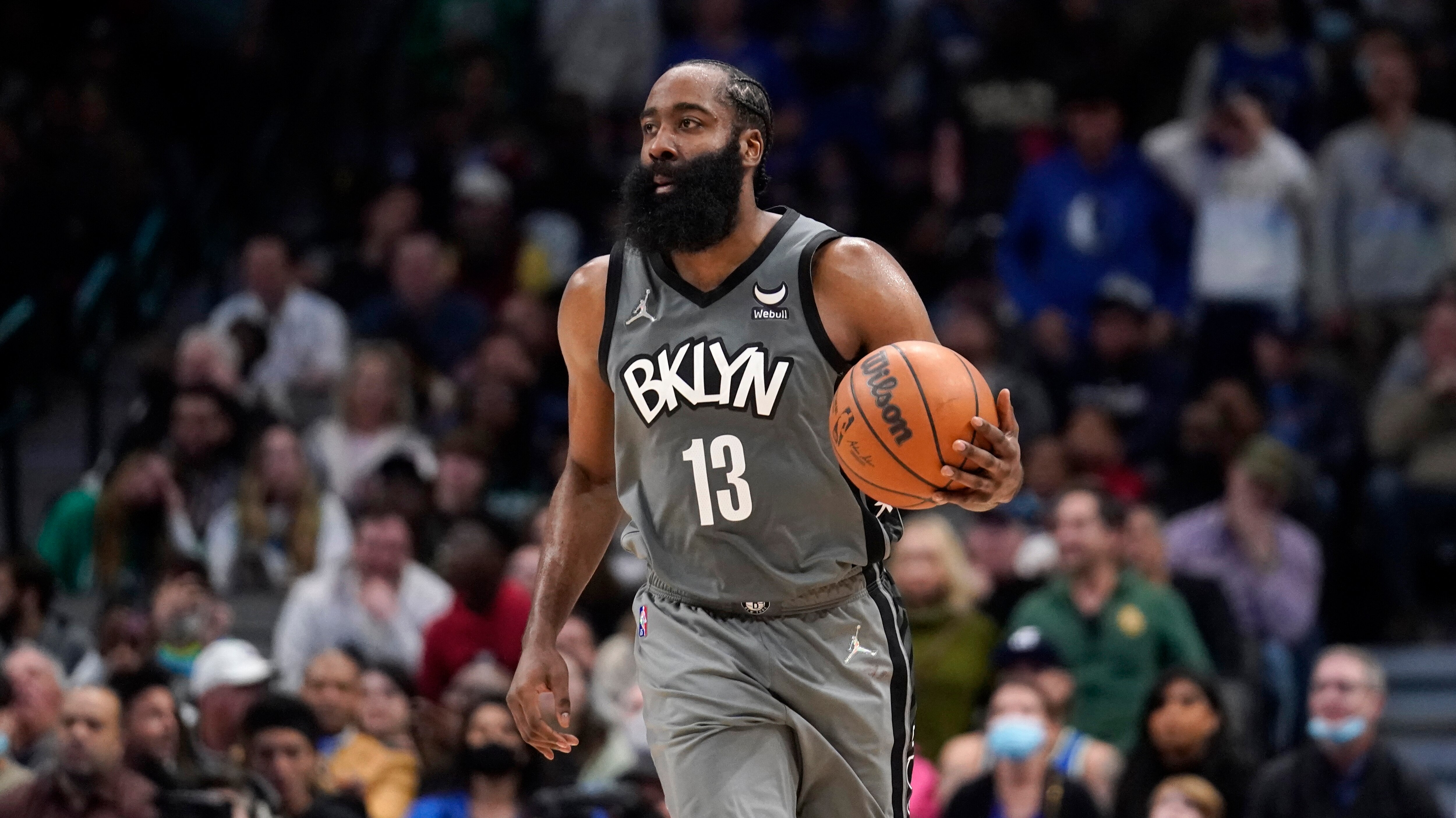 Brooklyn Nets guard James Harden advances the ball against the Dallas Mavericks during an NBA basketball game in Dallas, Tuesday, Dec. 7, 2021. (AP Photo/Tony Gutierrez)