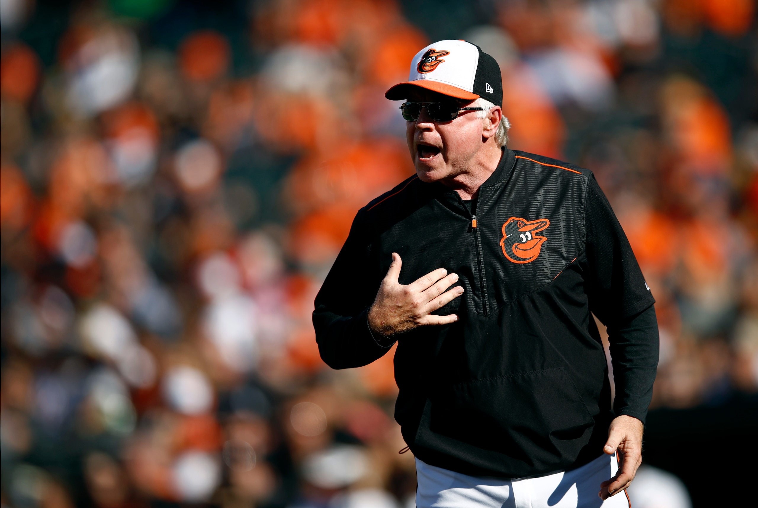 Baltimore Orioles manager Buck Showalter protests a call in the third inning of a baseball game against the Houston Astros, Sunday, Sept. 30, 2018, in Baltimore. (AP Photo/Patrick Semansky)