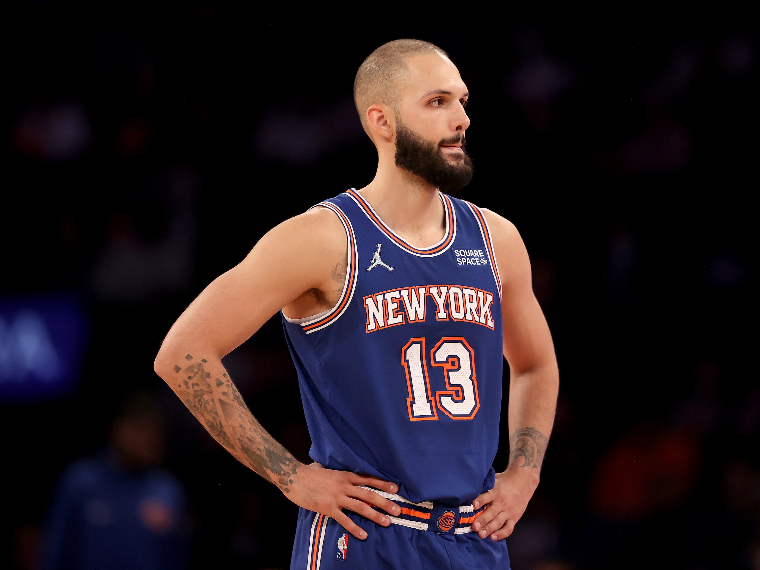 NEW YORK, NEW YORK - DECEMBER 04:  Evan Fournier #13 of the New York Knicks looks on in the fourth quarter against the Denver Nuggets at Madison Square Garden on December 04, 2021 in New York City. The Denver Nuggets defeated the New York Knicks 113-99. NOTE TO USER: User expressly acknowledges and agrees that, by downloading and or using this photograph, User is consenting to the terms and conditions of the Getty Images License Agreement. (Photo by Elsa/Getty Images)