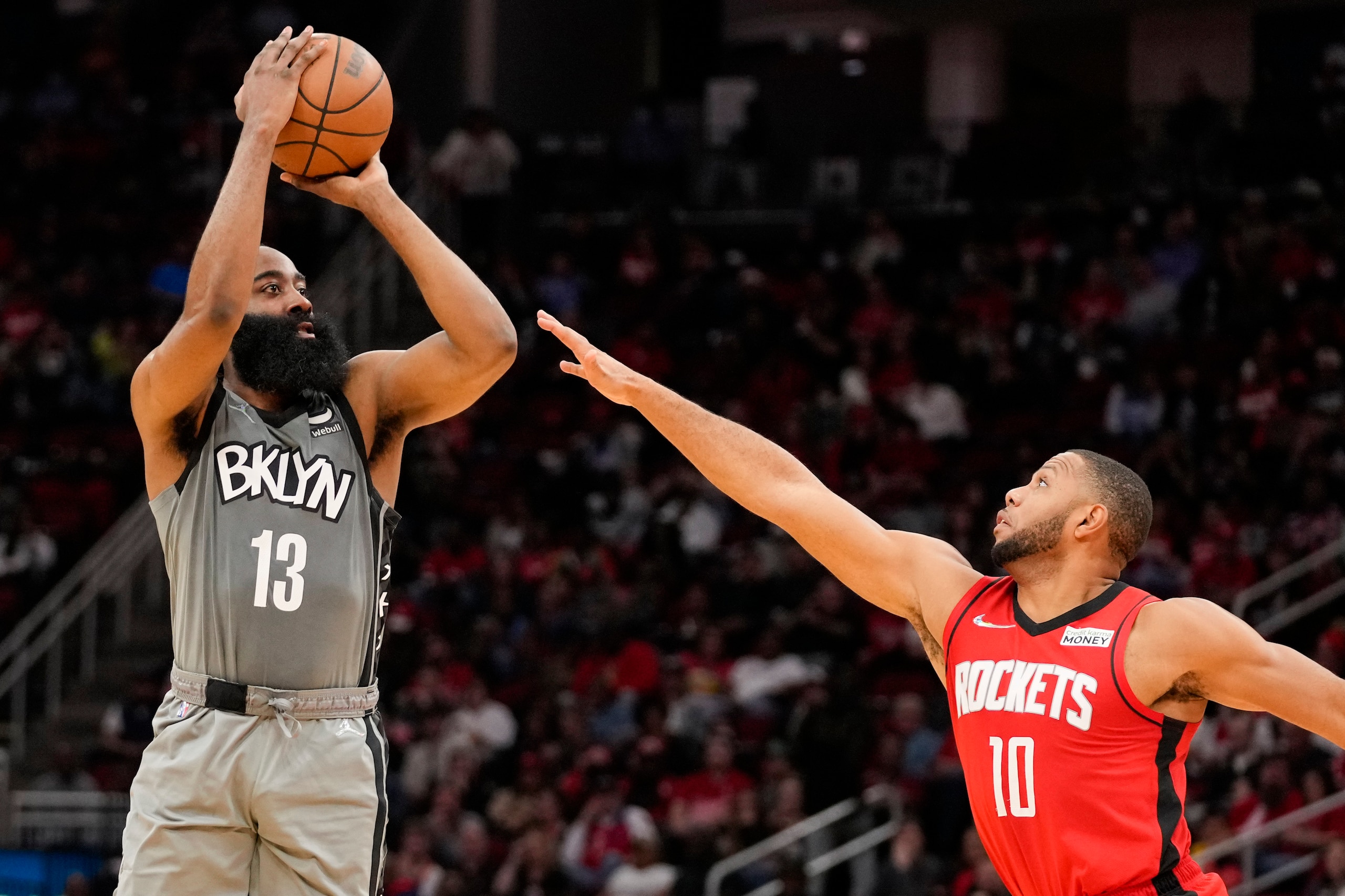 Brooklyn Nets guard James Harden (13) shoots a three point basket as Houston Rockets guard Eric Gordon defends during the first half of an NBA basketball game, Wednesday, Dec. 8, 2021, in Houston. (AP Photo/Eric Christian Smith) Brooklyn Nets guard James Harden (13) shoots a three point basket as Houston Rockets guard Eric Gordon defends during the first half of an NBA basketball game, Wednesday, Dec. 8, 2021, in Houston. (AP Photo/Eric Christian Smith)
