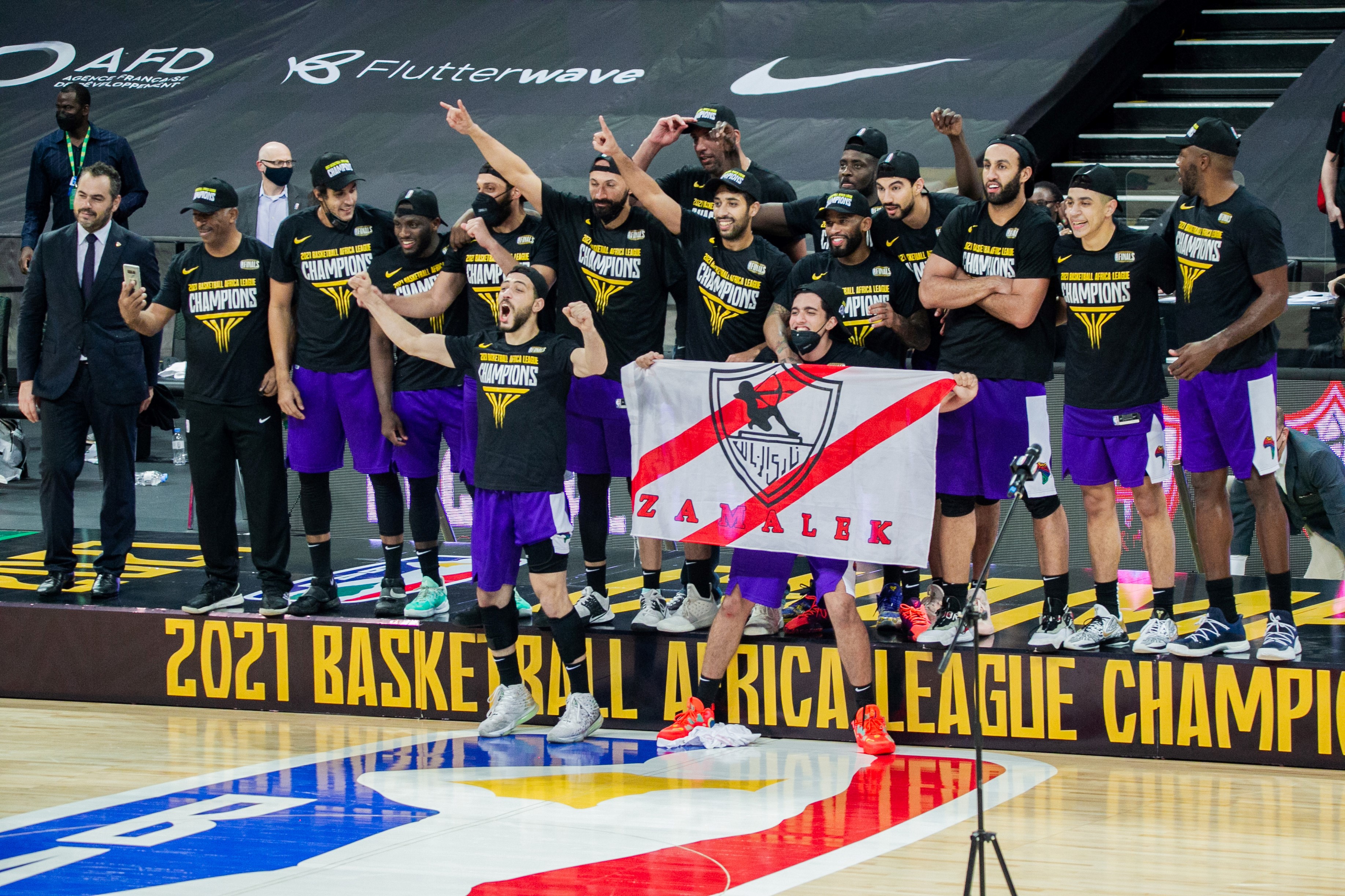 Members of Egypt's Zamalek Sporting Club celebrate after winning the inaugural Basketball Africa League BAL final against Union Sportive Monastirienne, known as US Monastir, of Tunisia in Kigali, capital city of Rwanda, May 30, 2021. (Photo by Cyril Ndegeya/Xinhua via Getty Images)