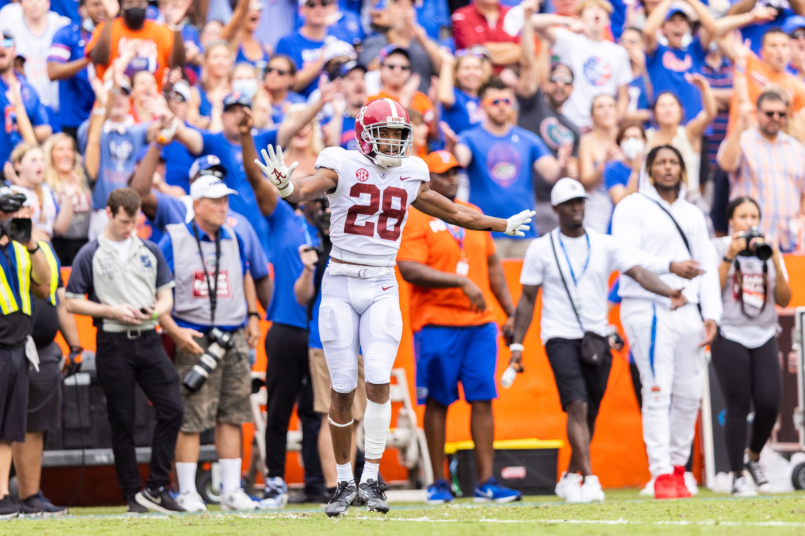 GAINESVILLE, FLORIDA - SEPTEMBER 18: Josh Jobe #28 of the Alabama Crimson Tide reacts to a flag during the second quarter of  a game against the Florida Gators at Ben Hill Griffin Stadium on September 18, 2021 in Gainesville, Florida. (Photo by James Gilbert/Getty Images)