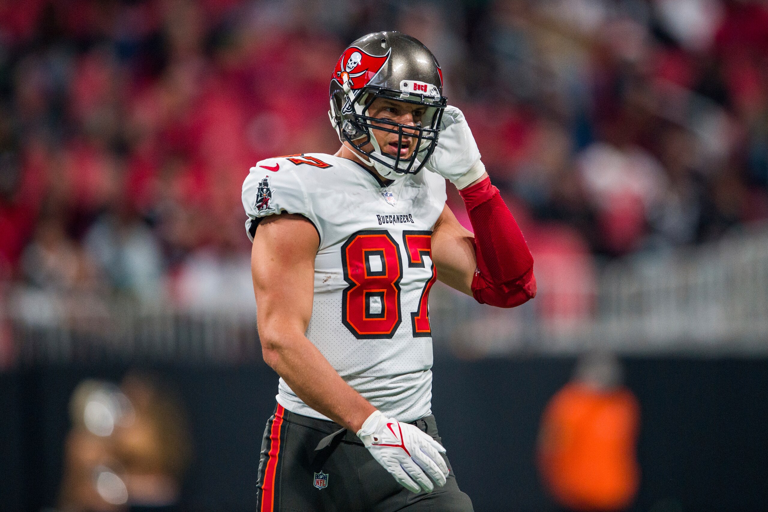 Tampa Bay Buccaneers tight end Rob Gronkowski (87) walks to the sideline during the first half of an NFL football game against the Atlanta Falcons, Sunday, Dec. 5, 2021, in Atlanta. The Tampa Bay Buccaneers won 30-17. (AP Photo/Danny Karnik)