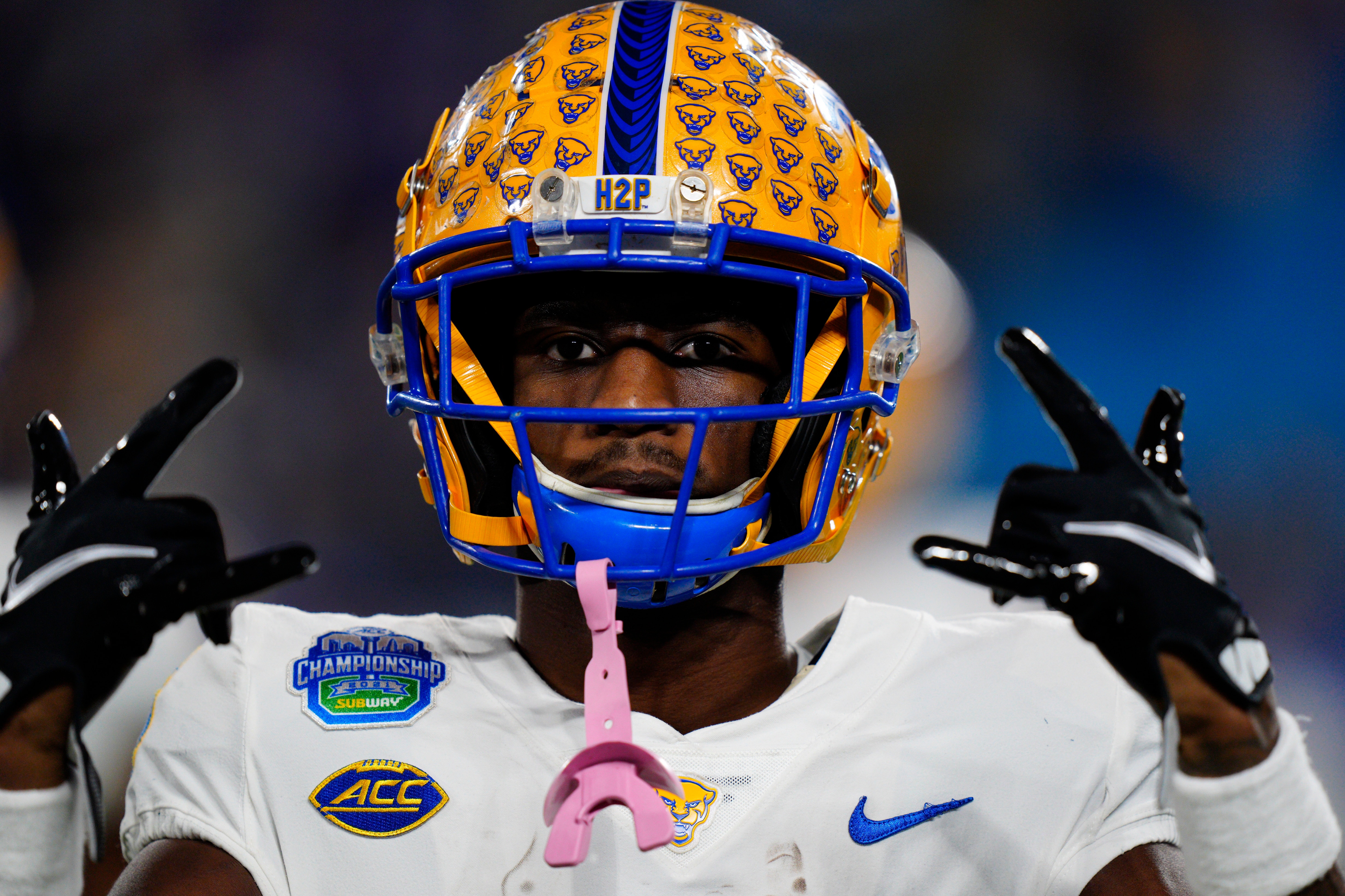 Pittsburgh wide receiver Jordan Addison arrives for the Atlantic Coast Conference championship NCAA college football game against Wake Forest Saturday, Dec. 4, 2021, in Charlotte, N.C. (AP Photo/Jacob Kupferman)