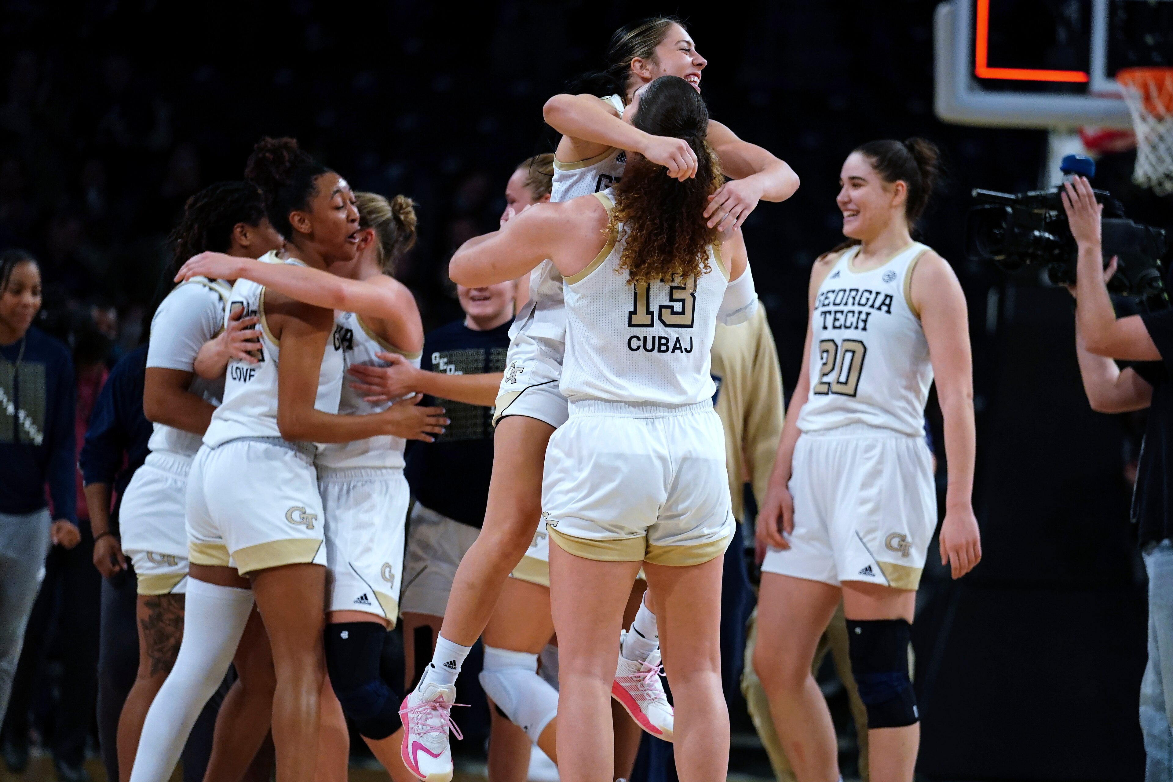 Georgia Tech's Sarah Bates (3) and Lorela Cubaj (13) celebrate after Georgia Tech defeated Connecticut in an NCAA college basketball game Thursday, Dec. 9, 2021, in Atlanta. (AP Photo/John Bazemore) Georgia Tech's Sarah Bates (3) and Lorela Cubaj (13) celebrate after Georgia Tech defeated Connecticut in an NCAA college basketball game Thursday, Dec. 9, 2021, in Atlanta. (AP Photo/John Bazemore)