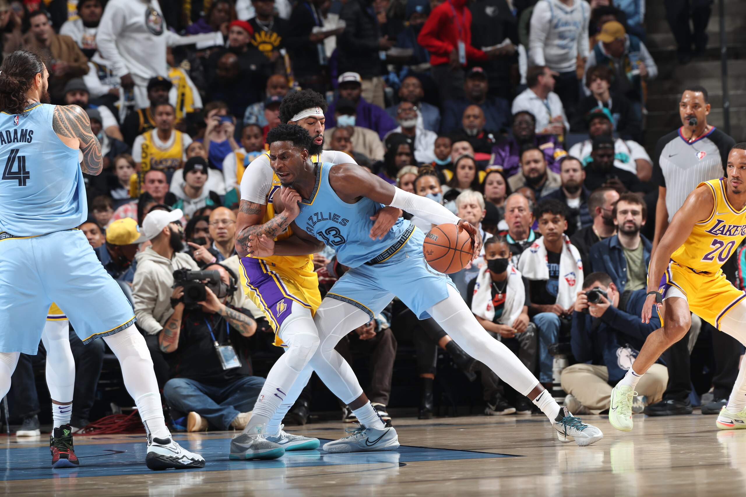 MEMPHIS, TN - DECEMBER 9: Jaren Jackson Jr. #13 of the Memphis Grizzlies dribbles the ball against the Los Angeles Lakers on December 9, 2021 at FedExForum in Memphis, Tennessee. NOTE TO USER: User expressly acknowledges and agrees that, by downloading and or using this photograph, User is consenting to the terms and conditions of the Getty Images License Agreement. Mandatory Copyright Notice: Copyright 2021 NBAE (Photo by Joe Murphy/NBAE via Getty Images)