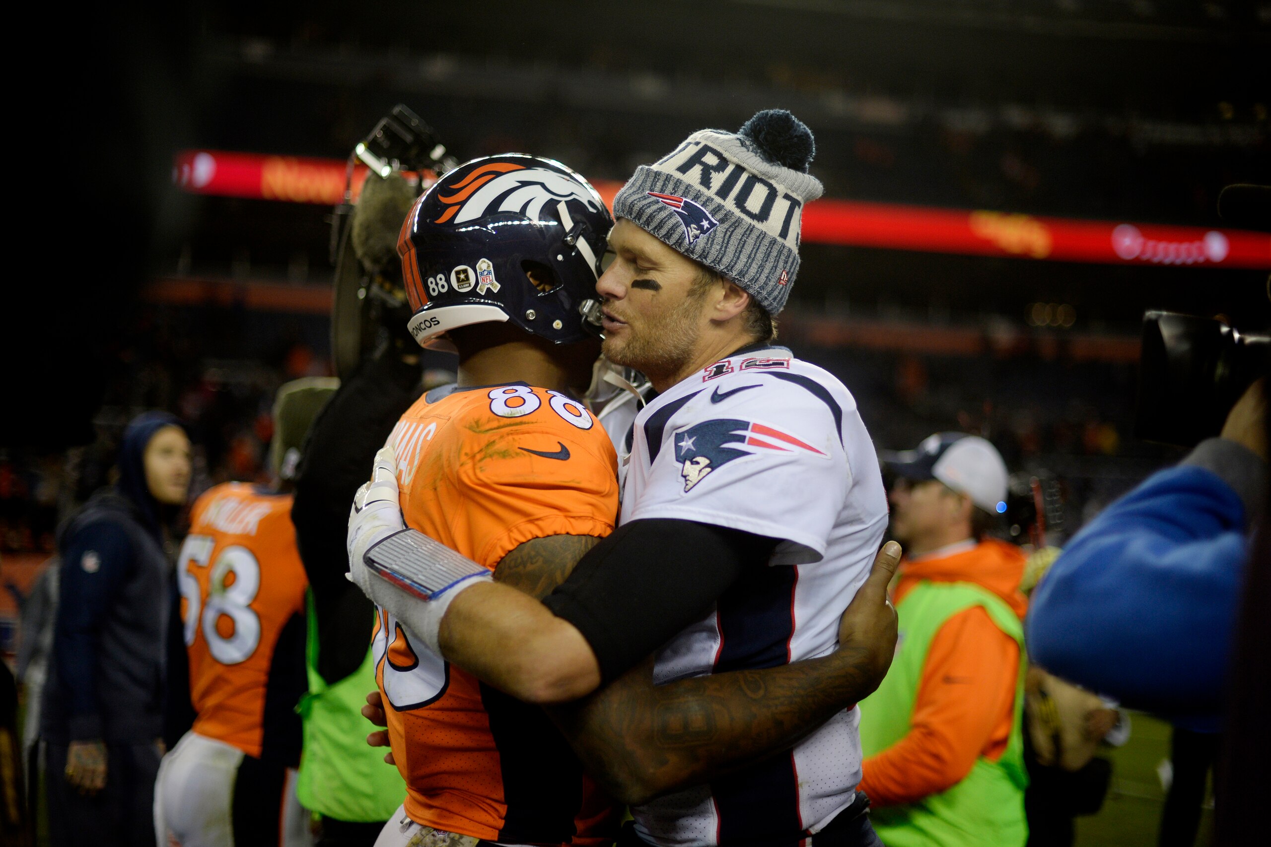DENVER, CO - NOVEMBER 12: Tom Brady (12) of the New England Patriots holds Demaryius Thomas (88) of the Denver Broncos close after the Patriots' 41-16 win on Sunday, November 12, 2017. The Denver Broncos hosted the New England Patriots. (Photo by AAron Ontiveroz/The Denver Post via Getty Images)