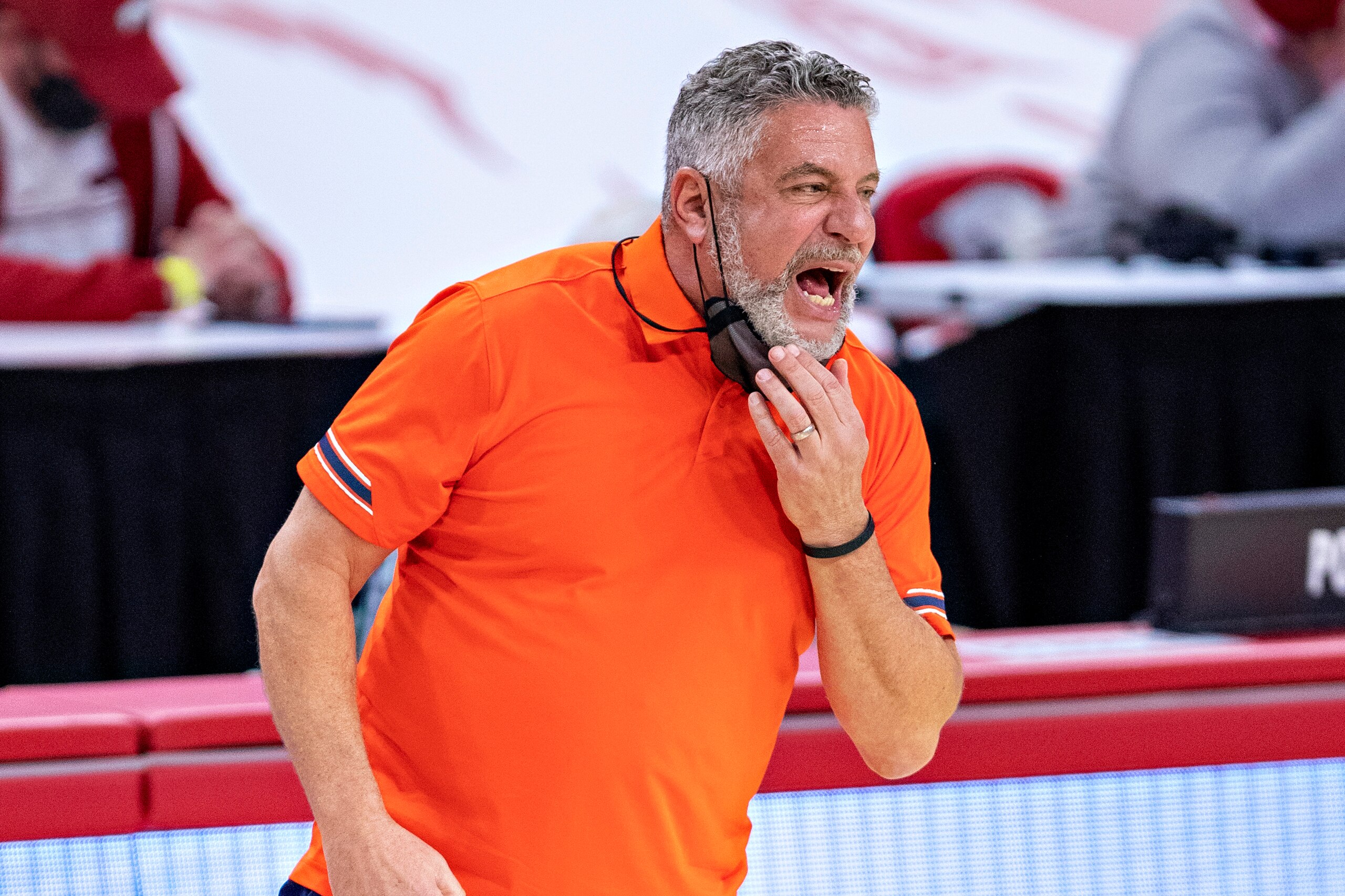 FAYETTEVILLE, ARKANSAS - JANUARY 20: Head coach Bruce Pearl of the Auburn Tigers yells at his team during a game against the Arkansas Razorbacks at Bud Walton Arena on January 20, 2021 in Fayetteville, Arkansas. The Razorbacks defeated the Tigers 75-73.  (Photo by Wesley Hitt/Getty Images)