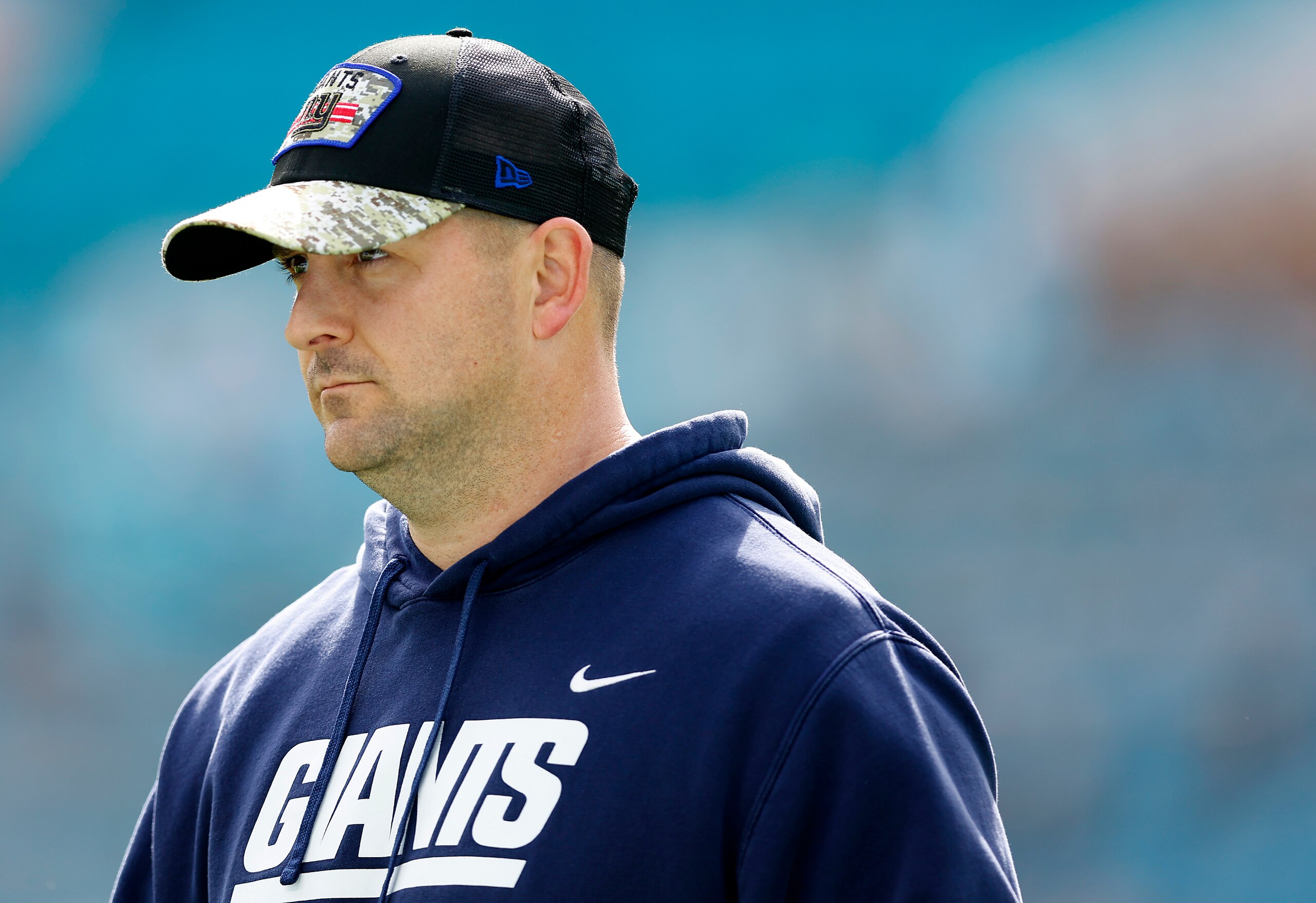 MIAMI GARDENS, FLORIDA - DECEMBER 05: Head coach Joe Judge of the New York Giants looks on before the game against the Miami Dolphins at Hard Rock Stadium on December 05, 2021 in Miami Gardens, Florida. (Photo by Michael Reaves/Getty Images)