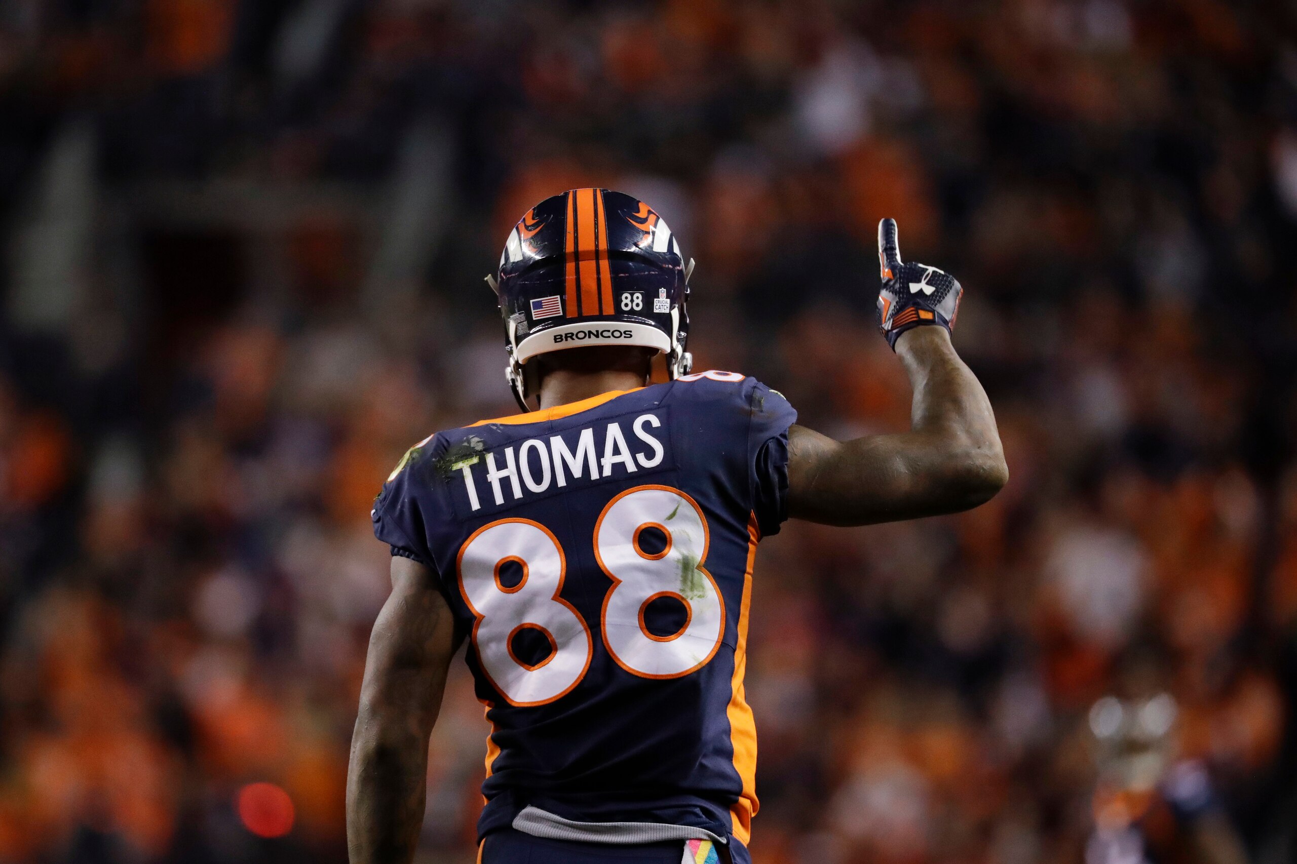 FILE - Denver Broncos wide receiver Demaryius Thomas reacts after making a catch during the first half of the team's NFL football game against the New York Giants on Oct. 15, 2017, in Denver. Thomas, who eared five straight Pro Bowls and a Super Bowl ring during a prolific receiving career spent mostly with the Broncos, has died at the age of 33. Thomas was found dead in his suburban Atlanta home Thursday night, Dec. 9, 2021, said Officer Tim Lupo, public information officer for the police department in Roswell, Ga. (AP Photo/Jack Dempsey, File)