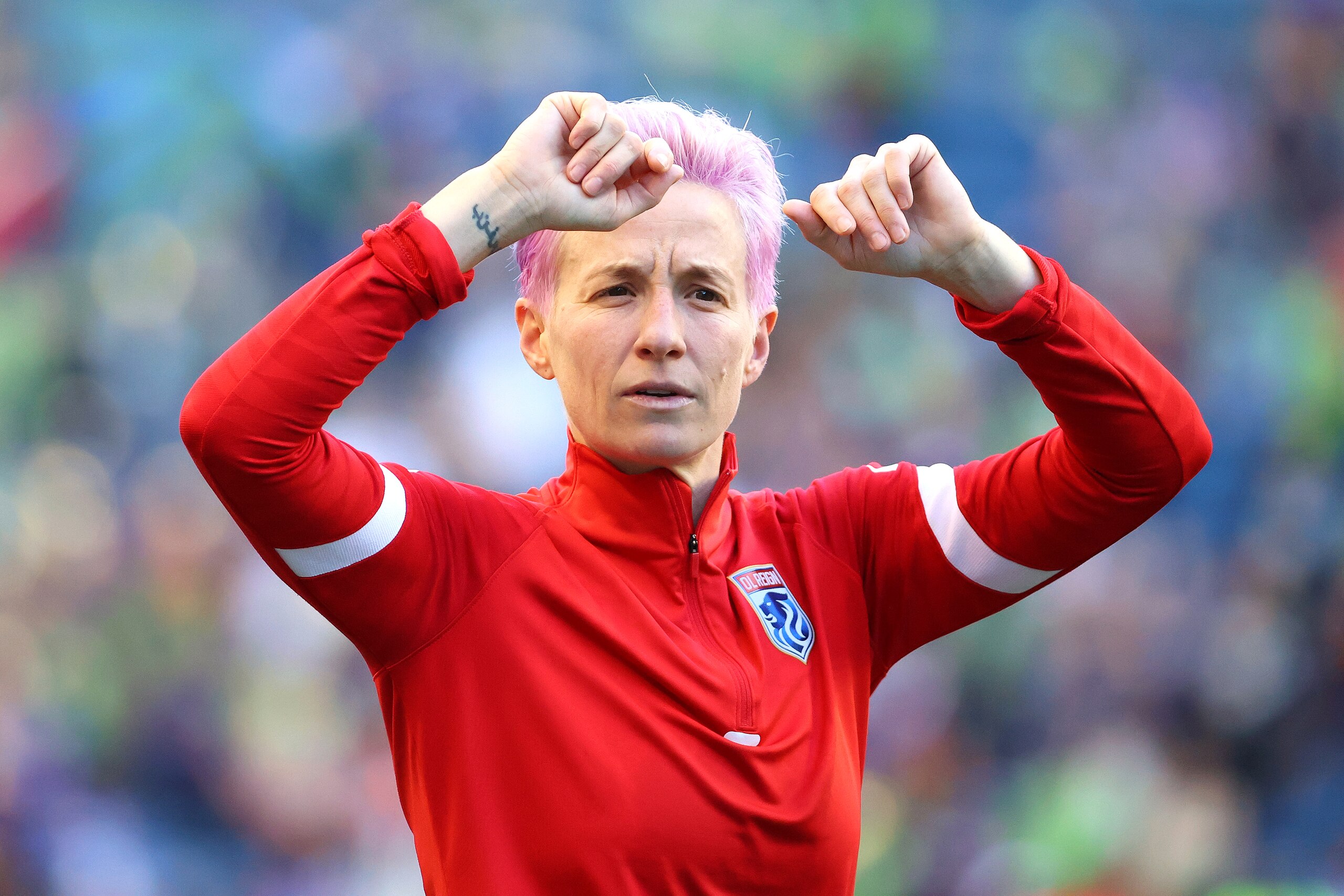 TACOMA, WASHINGTON - AUGUST 29: Megan Rapinoe #15 of OL Reign reacts after the 2-1 win against Portland Thorns FC at Lumen Field on August 29, 2021 in Seattle, Washington. (Photo by Abbie Parr/Getty Images)