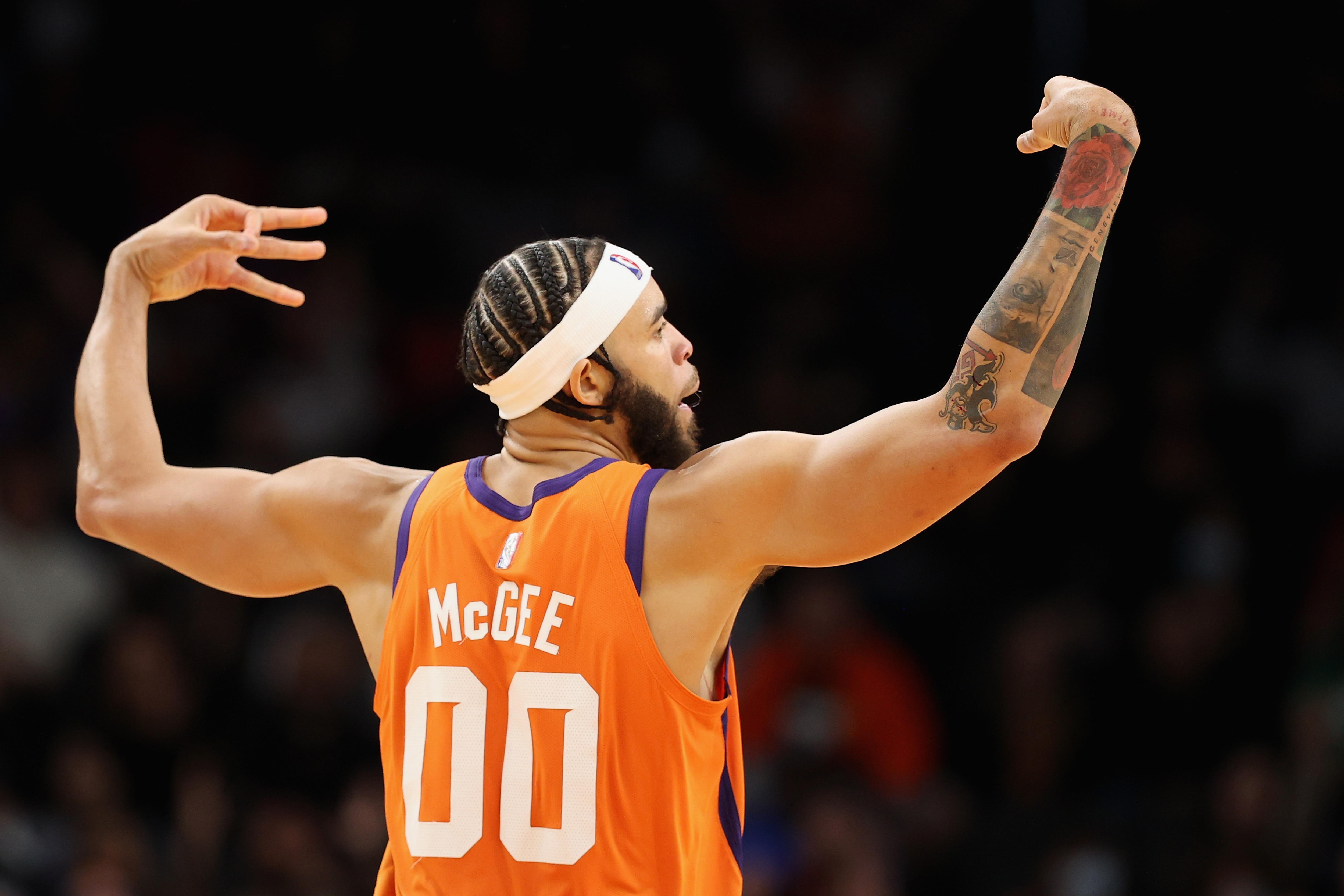 PHOENIX, ARIZONA - DECEMBER 10: JaVale McGee #00 of the Phoenix Suns reacts to a three-point shot against the Boston Celtics during the first half of the NBA game at Footprint Center on December 10, 2021 in Phoenix, Arizona. NOTE TO USER: User expressly acknowledges and agrees that, by downloading and or using this photograph, User is consenting to the terms and conditions of the Getty Images License Agreement. (Photo by Christian Petersen/Getty Images) PHOENIX, ARIZONA - DECEMBER 10: JaVale McGee #00 of the Phoenix Suns reacts to a three-point shot against the Boston Celtics during the first half of the NBA game at Footprint Center on December 10, 2021 in Phoenix, Arizona. NOTE TO USER: User expressly acknowledges and agrees that, by downloading and or using this photograph, User is consenting to the terms and conditions of the Getty Images License Agreement. (Photo by Christian Petersen/Getty Images)