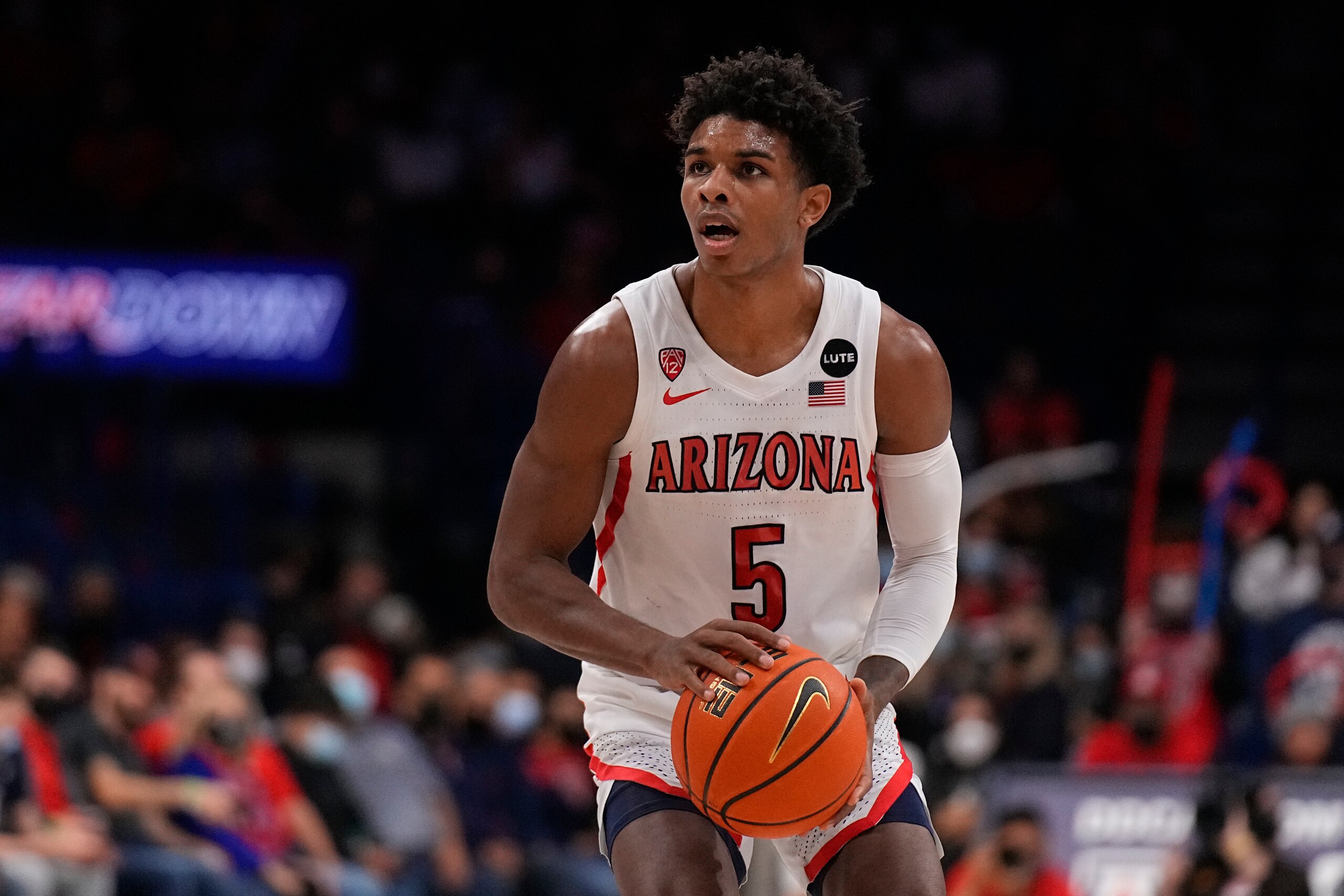 Arizona guard Justin Kier (5) during the first half of an NCAA college basketball game against Wyoming, Wednesday, Dec. 8, 2021, in Tucson, Ariz. (AP Photo/Rick Scuteri)