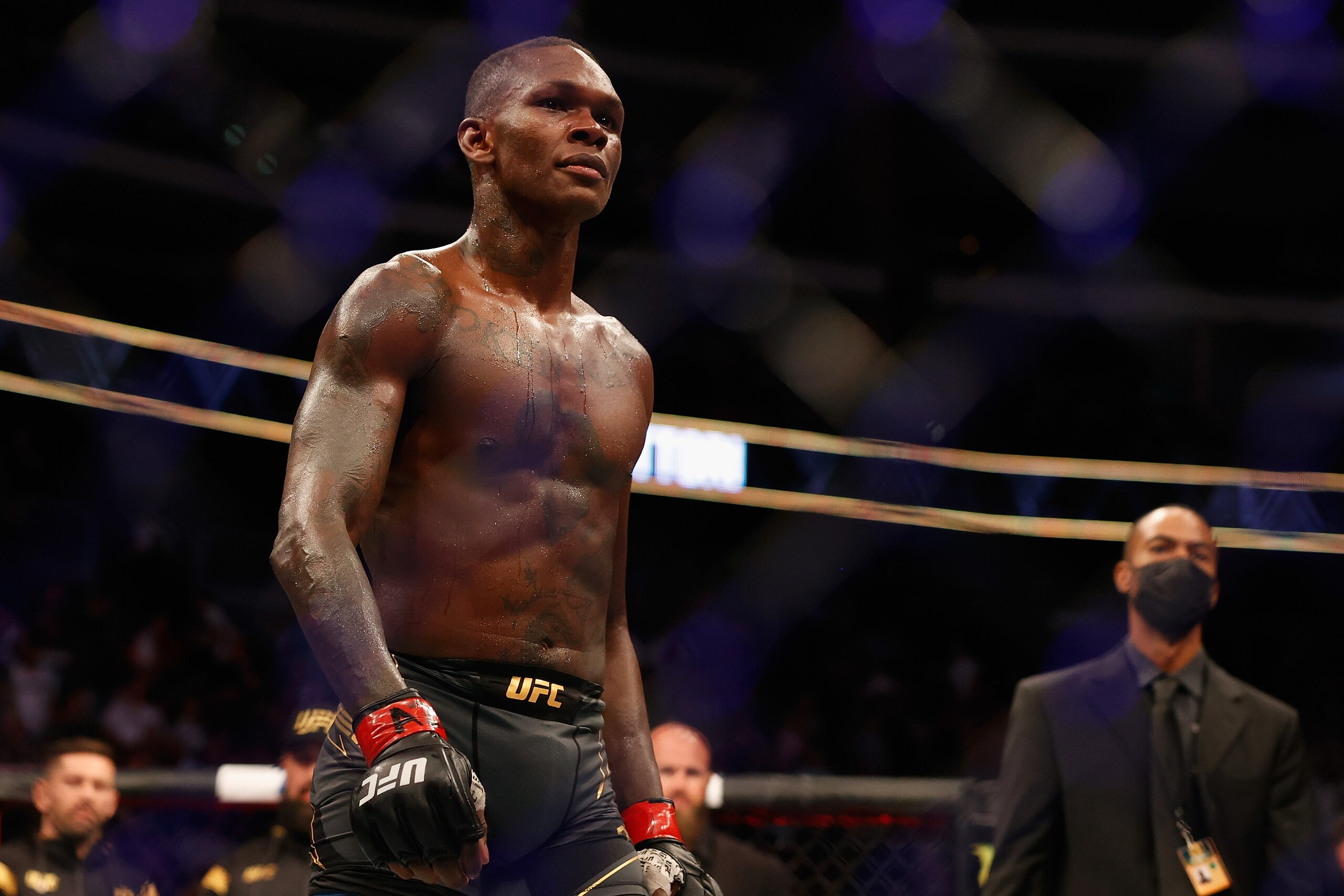 GLENDALE, ARIZONA - JUNE 12: Israel Adesanya of Nigeria reacts after defeating Marvin Vettori of Italy by unanimous decision to win the middleweight championship during UFC 263 at Gila River Arena on June 12, 2021 in Glendale, Arizona.