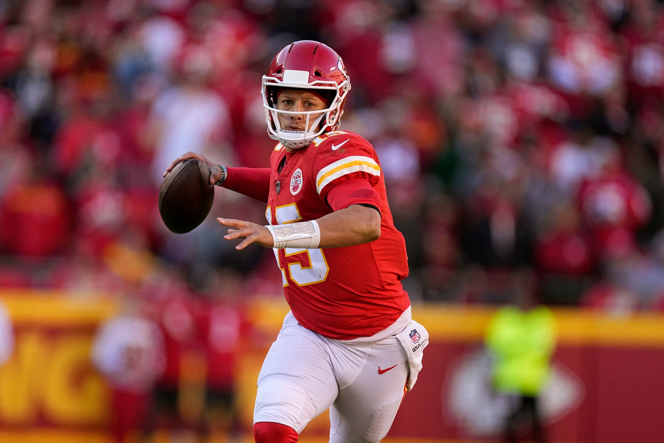 Kansas City Chiefs quarterback Patrick Mahomes throws during the second half of an NFL football game against the Las Vegas Raiders Sunday, Dec. 12, 2021, in Kansas City, Mo. (AP Photo/Charlie Riedel)