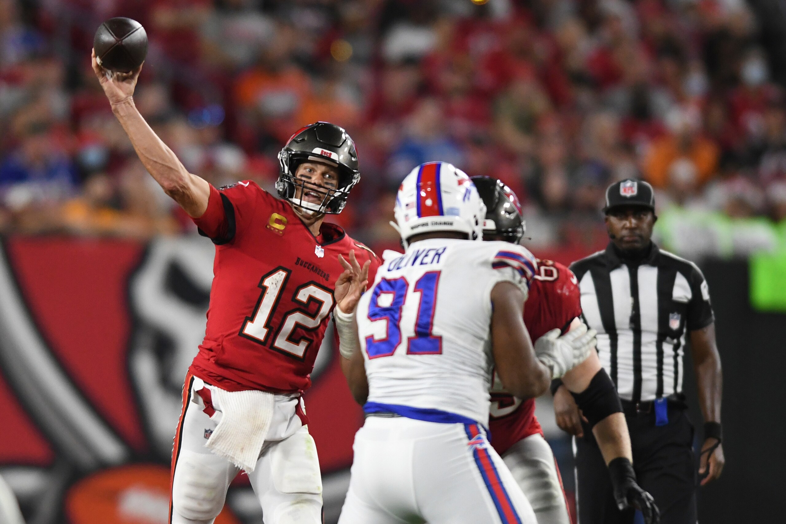Tampa Bay Buccaneers quarterback Tom Brady (12) throws a pass against the Buffalo Bills during the second half of an NFL football game Sunday, Dec. 12, 2021, in Tampa, Fla. (AP Photo/Jason Behnken)