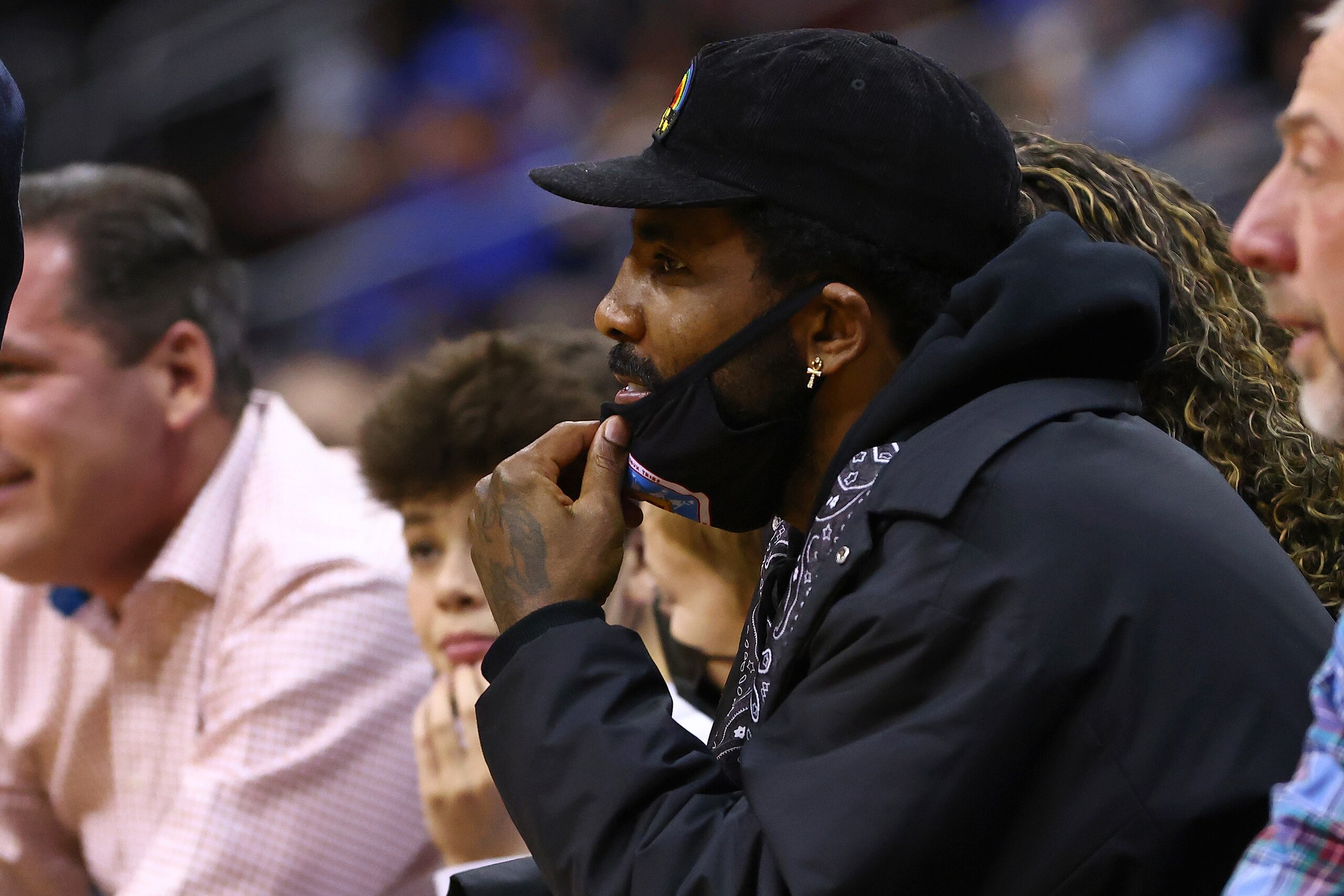 NEWARK, NJ - DECEMBER 01: Kyrie Irving of the Brooklyn Nets watches the action between the Wagner Seahawks and the Seton Hall Pirates during the game at Prudential Center on December 1, 2021 in Newark, New Jersey. Seton Hall defeated Wagner 85-63. (Photo by Rich Schultz/Getty Images)